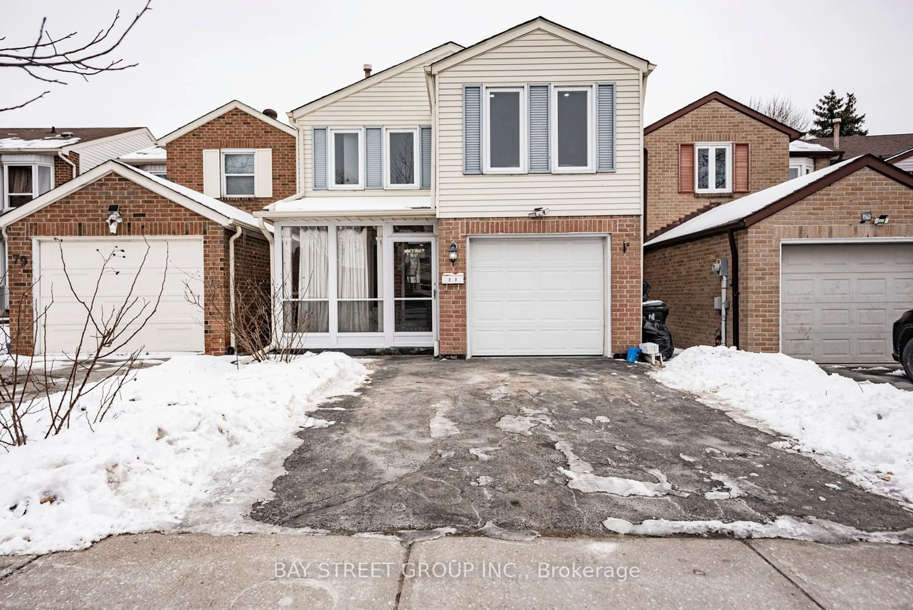 Home with brick exterior material, street for 77 Sandyhook Sq, Toronto Ontario M1W 3N6