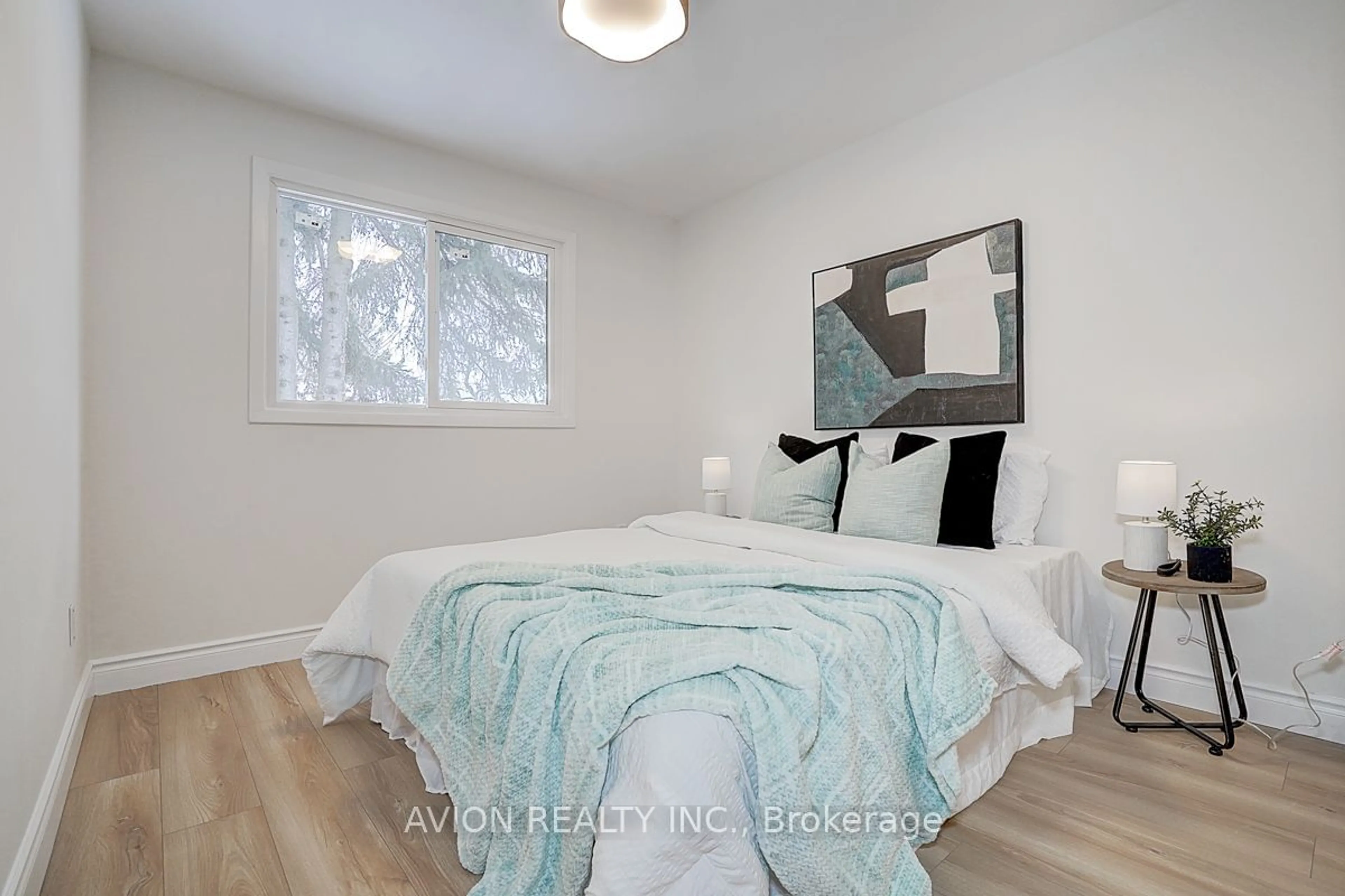 Bedroom with bed, wood/laminate floor for 250 Sprucewood Crt, Toronto Ontario M1W 1P7