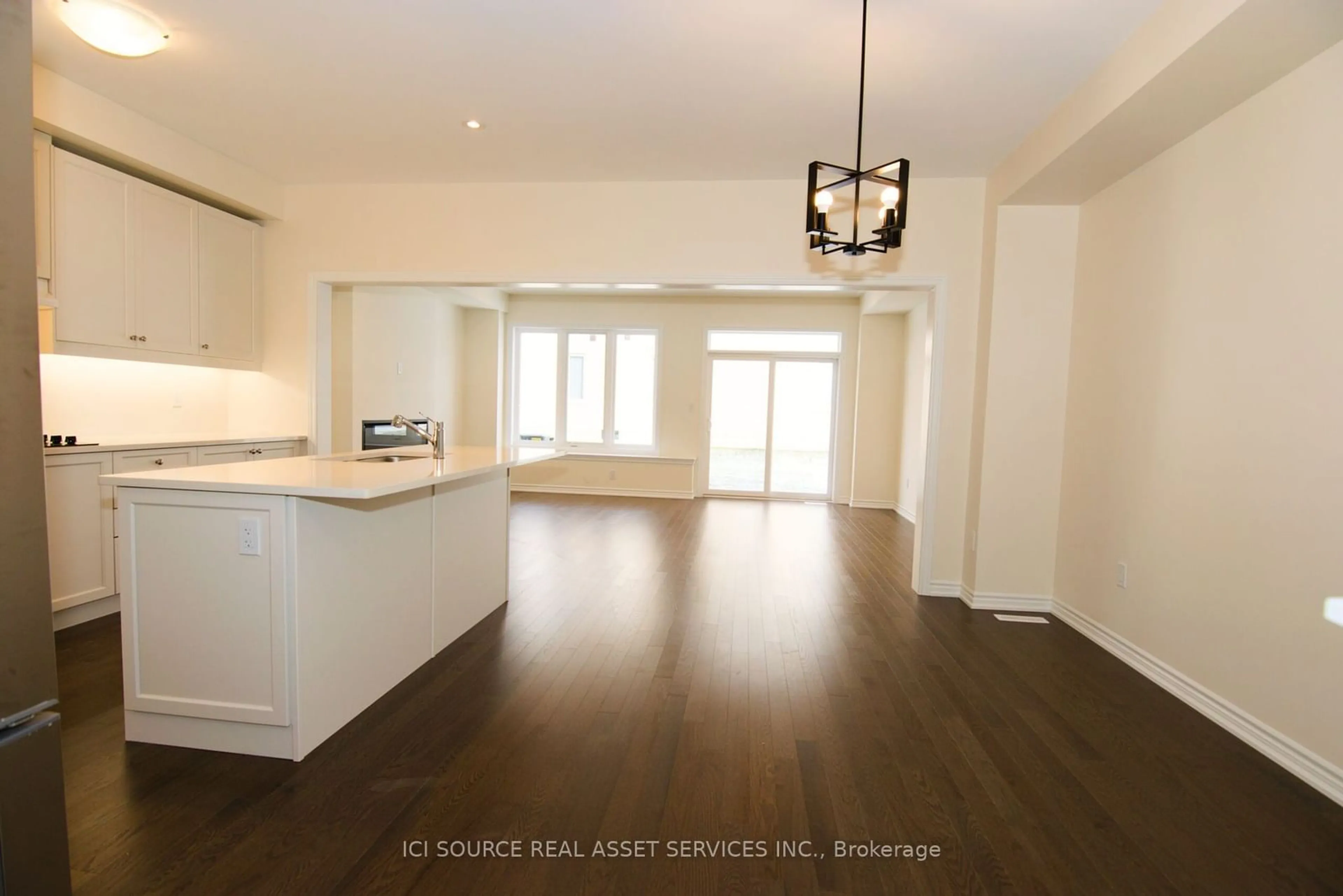 Open concept kitchen, wood/laminate floor for 50 Mountainside Cres, Whitby Ontario L1R 0P4