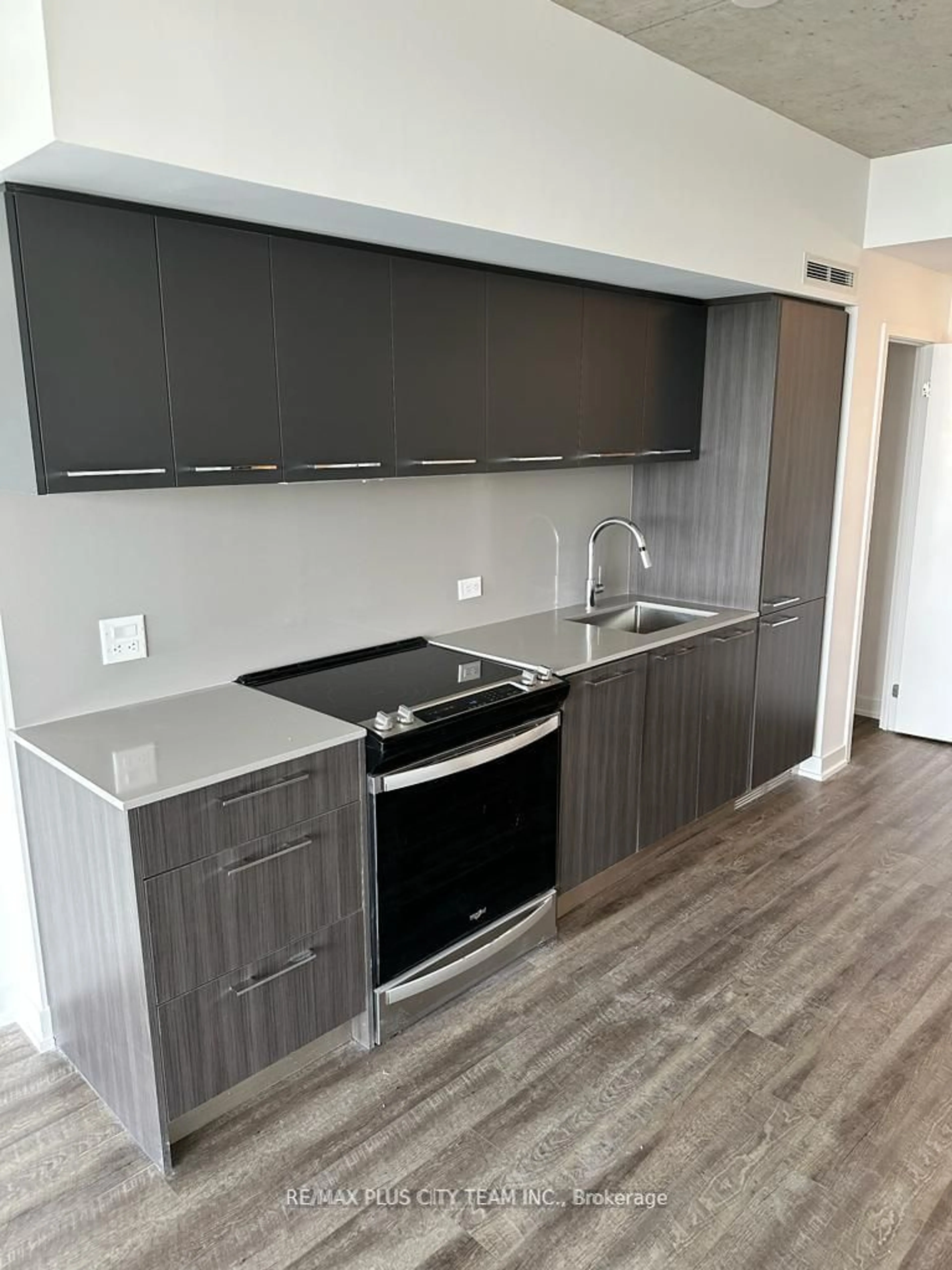 Standard kitchen, wood/laminate floor for 45 Baseball Pl #806, Toronto Ontario M4M 0H1