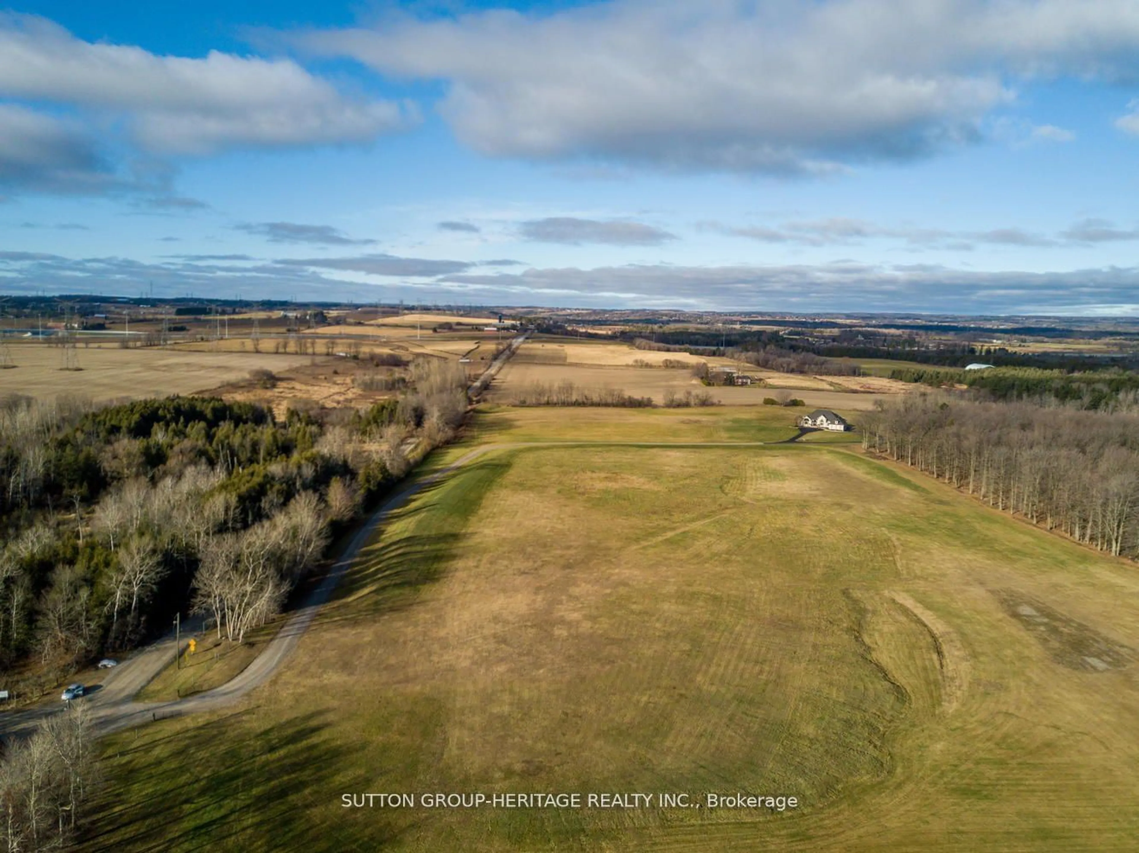 A pic from outside/outdoor area/front of a property/back of a property/a pic from drone, water/lake/river/ocean view for 2100 Taunton Rd, Clarington Ontario L0B 1J0