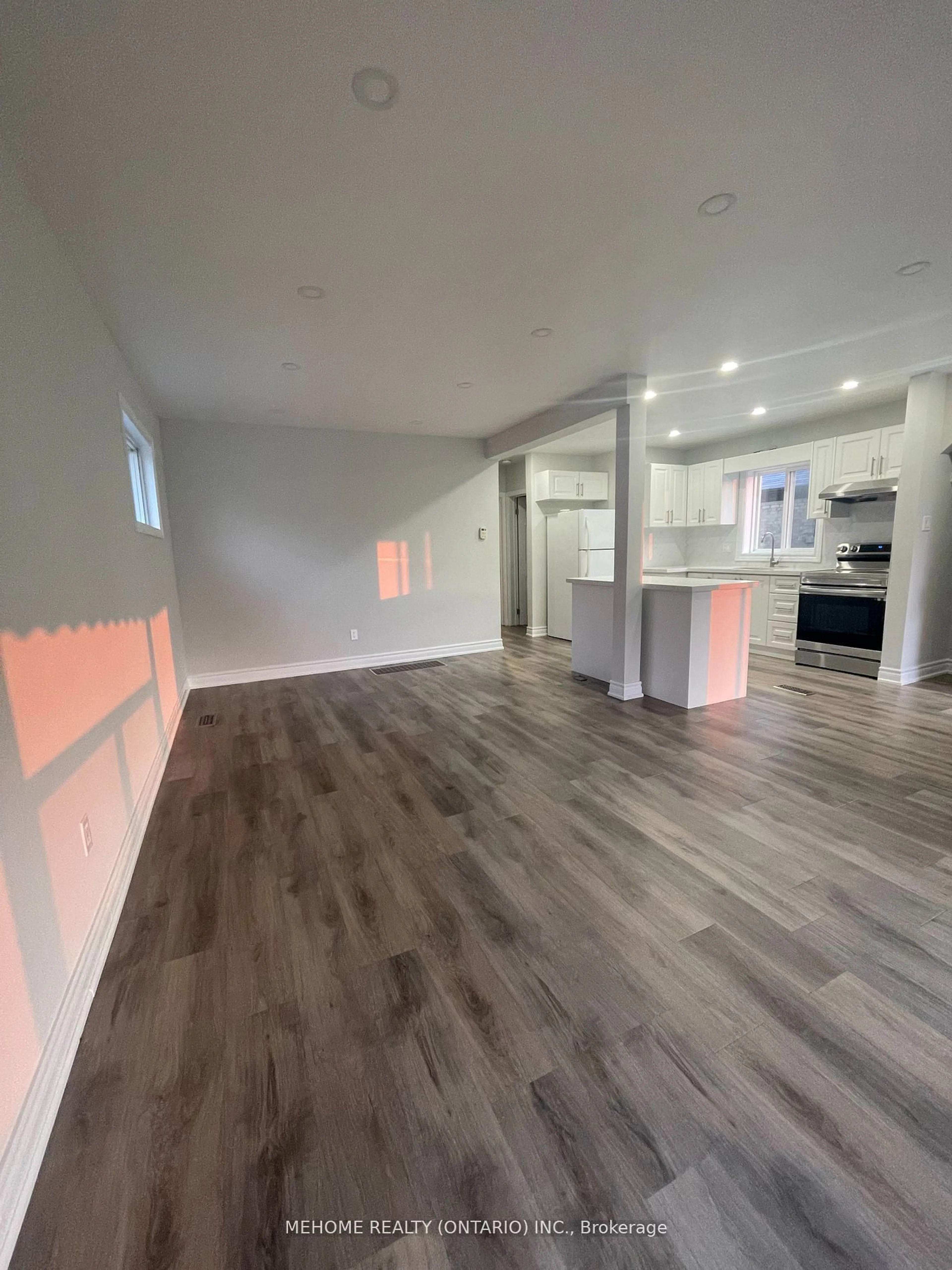 Open concept kitchen, wood/laminate floor for 65 Miramar Cres, Toronto Ontario M1J 1R3