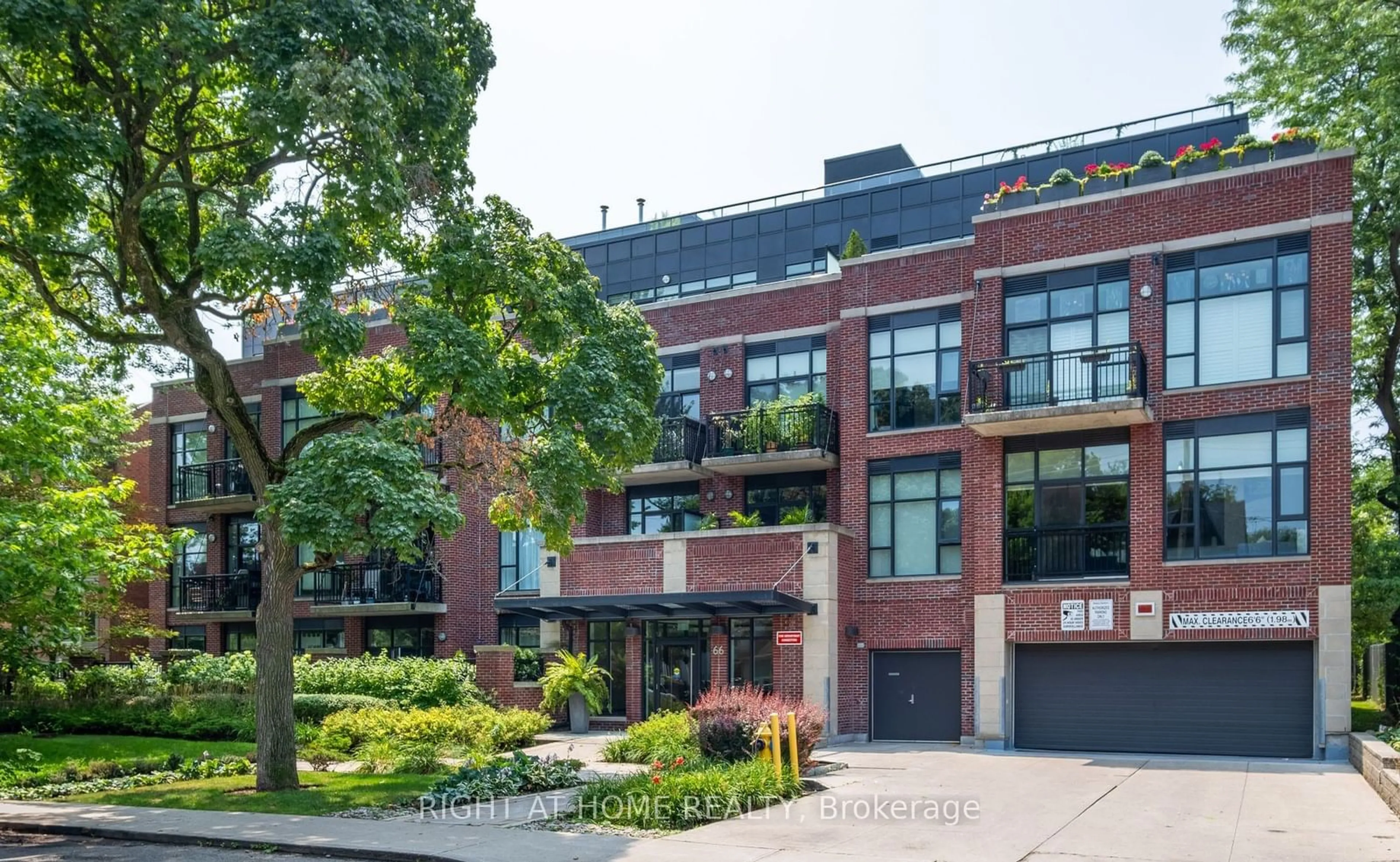 Home with brick exterior material, street for 66 Kippendavie Ave #217, Toronto Ontario M4L 0A4