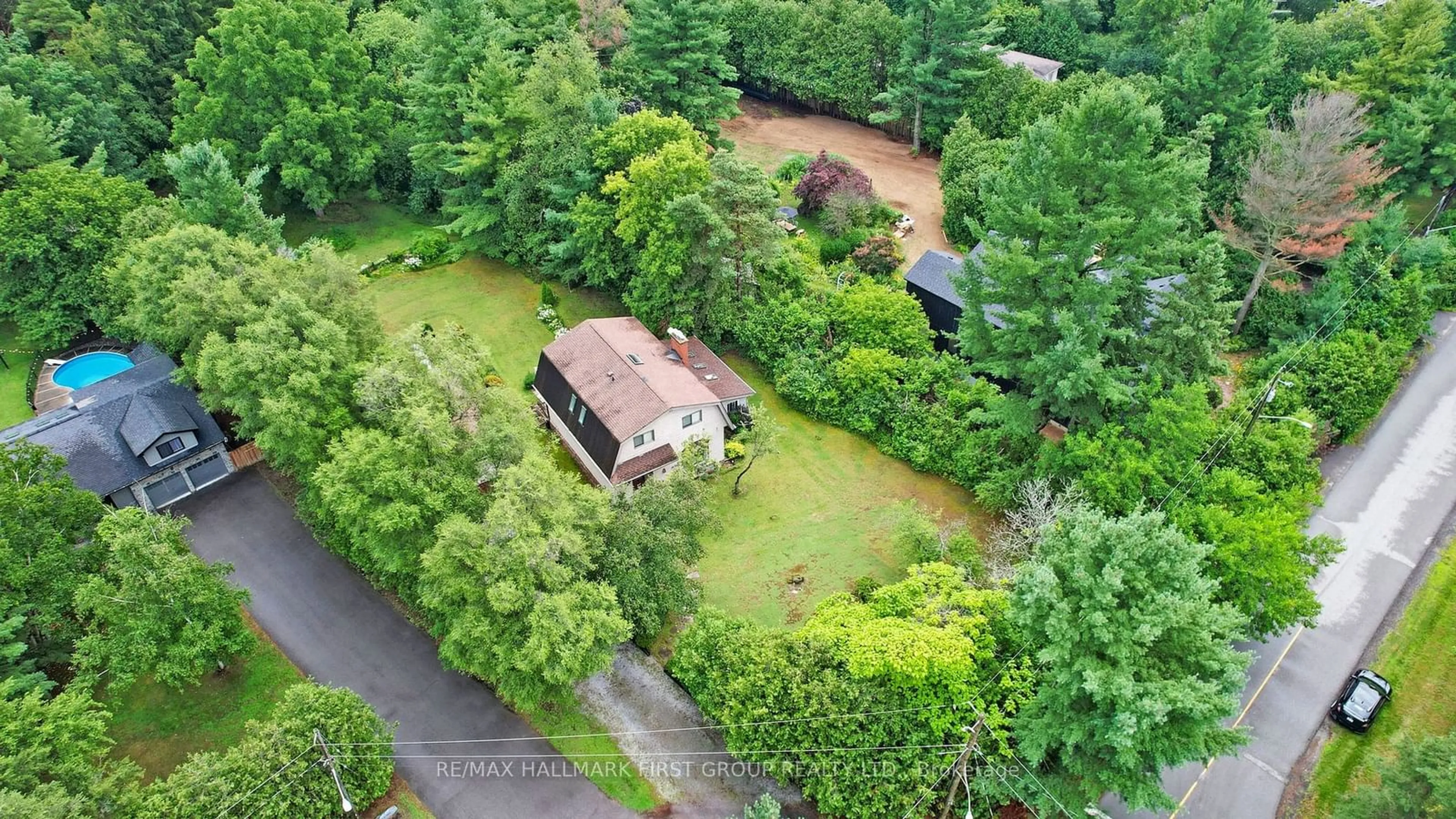 A pic from outside/outdoor area/front of a property/back of a property/a pic from drone, forest/trees view for 5 Shepherd Rd, Whitby Ontario L1M 1G8