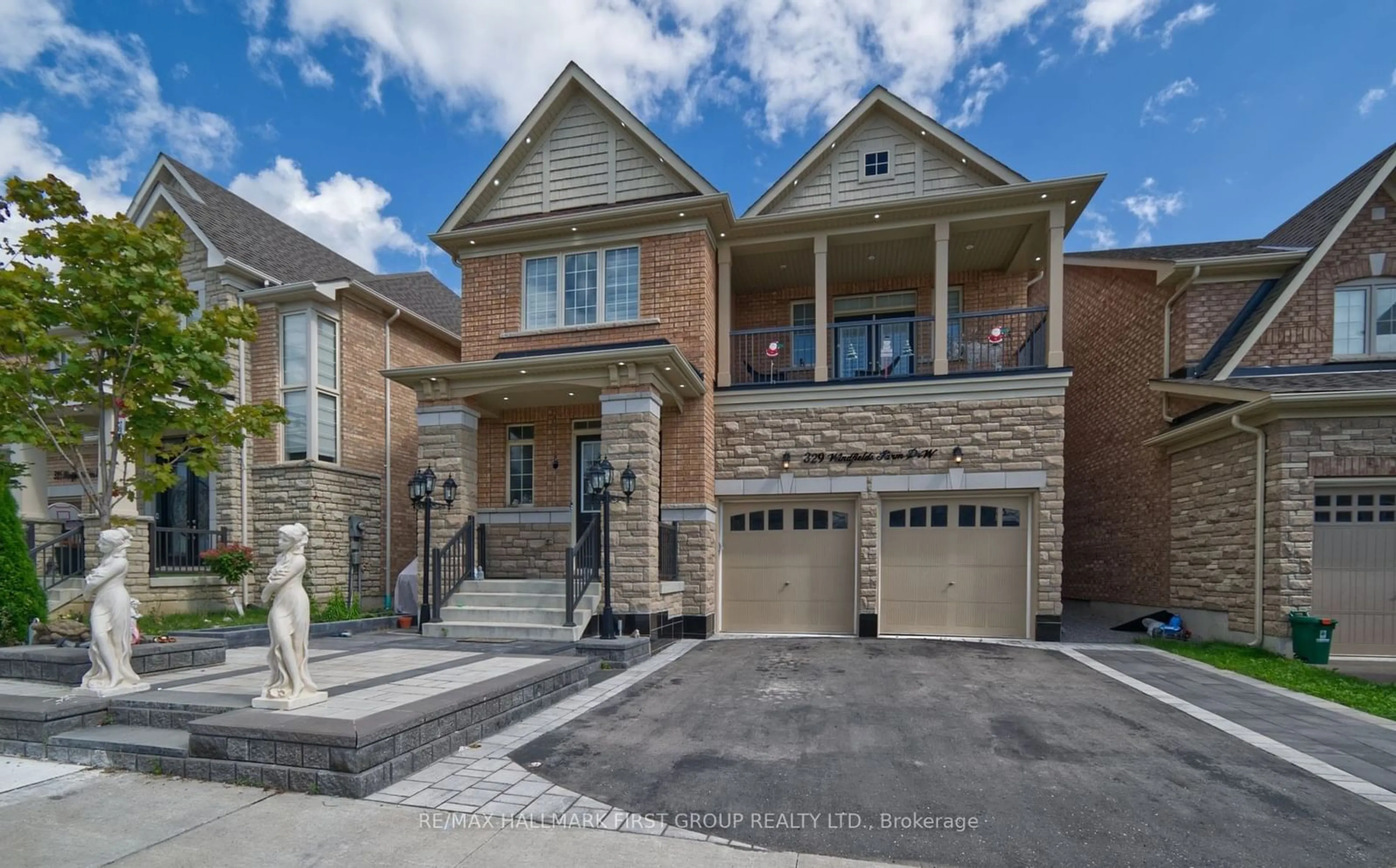 Home with brick exterior material, street for 329 Windfields Farm Dr, Oshawa Ontario L1L 0M2