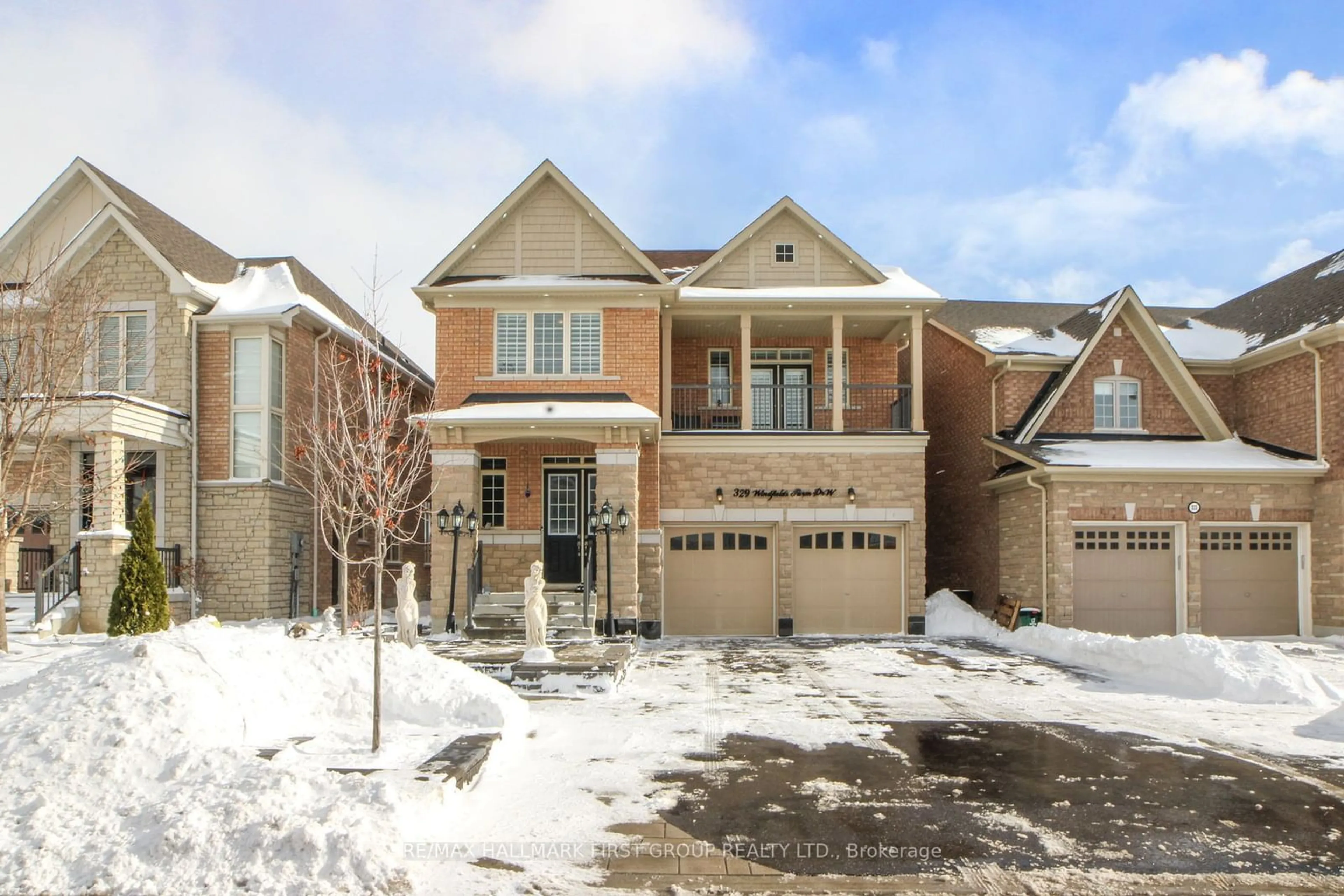 Home with brick exterior material, street for 329 Windfields Farm Dr, Oshawa Ontario L1L 0M2