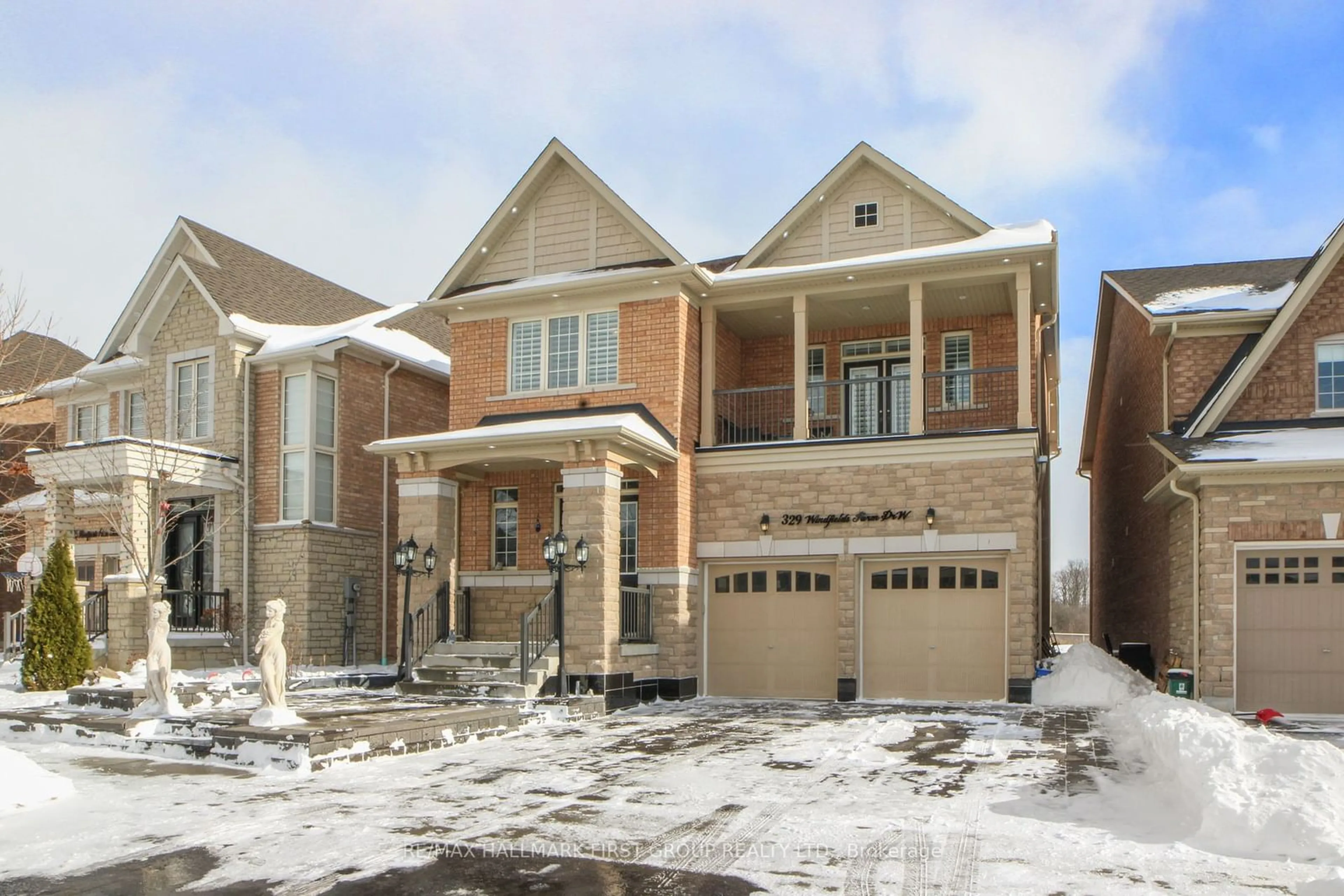 Home with brick exterior material, street for 329 Windfields Farm Dr, Oshawa Ontario L1L 0M2