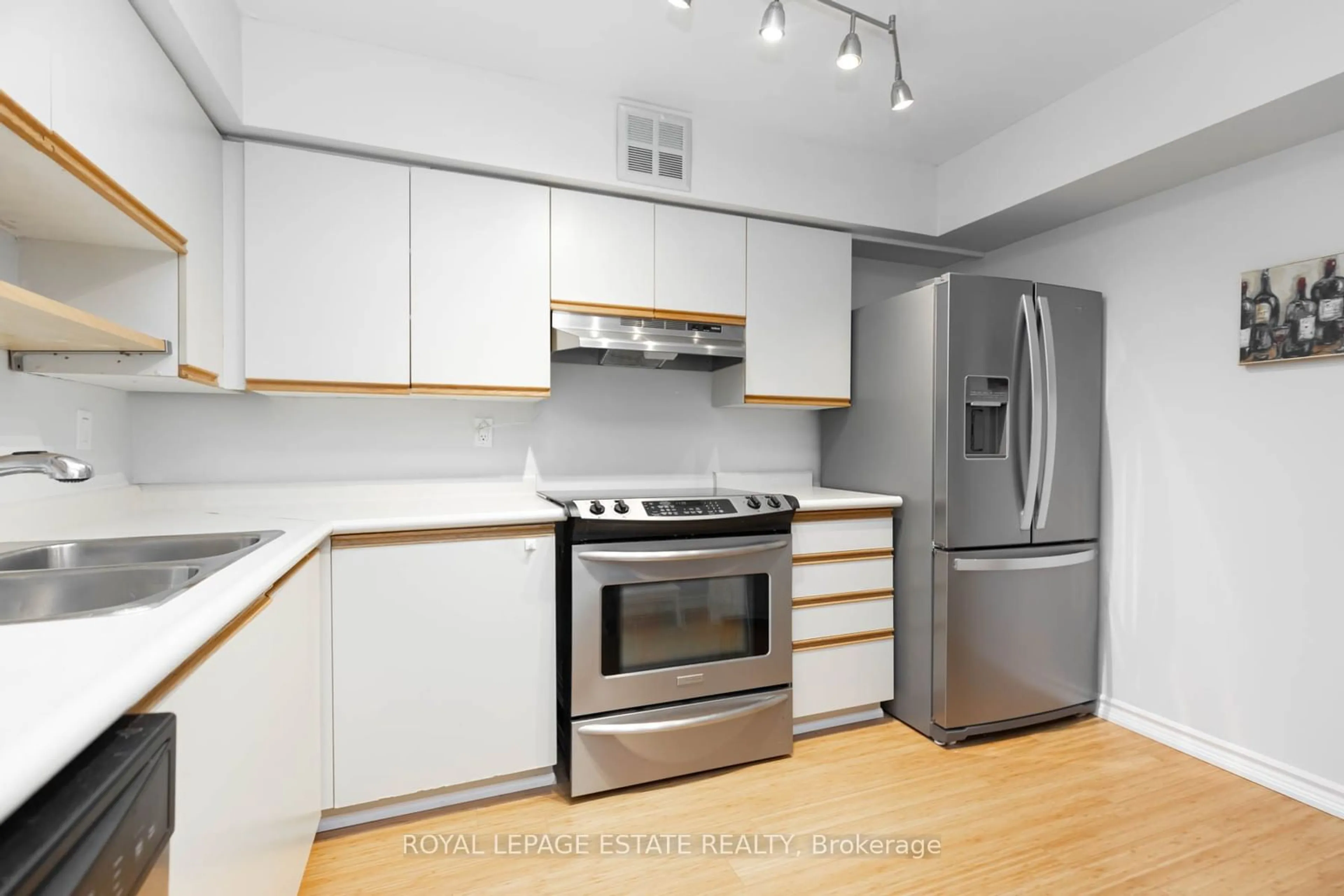 Standard kitchen, wood/laminate floor for 4 Park Vista Dr #604, Toronto Ontario M4B 3M8