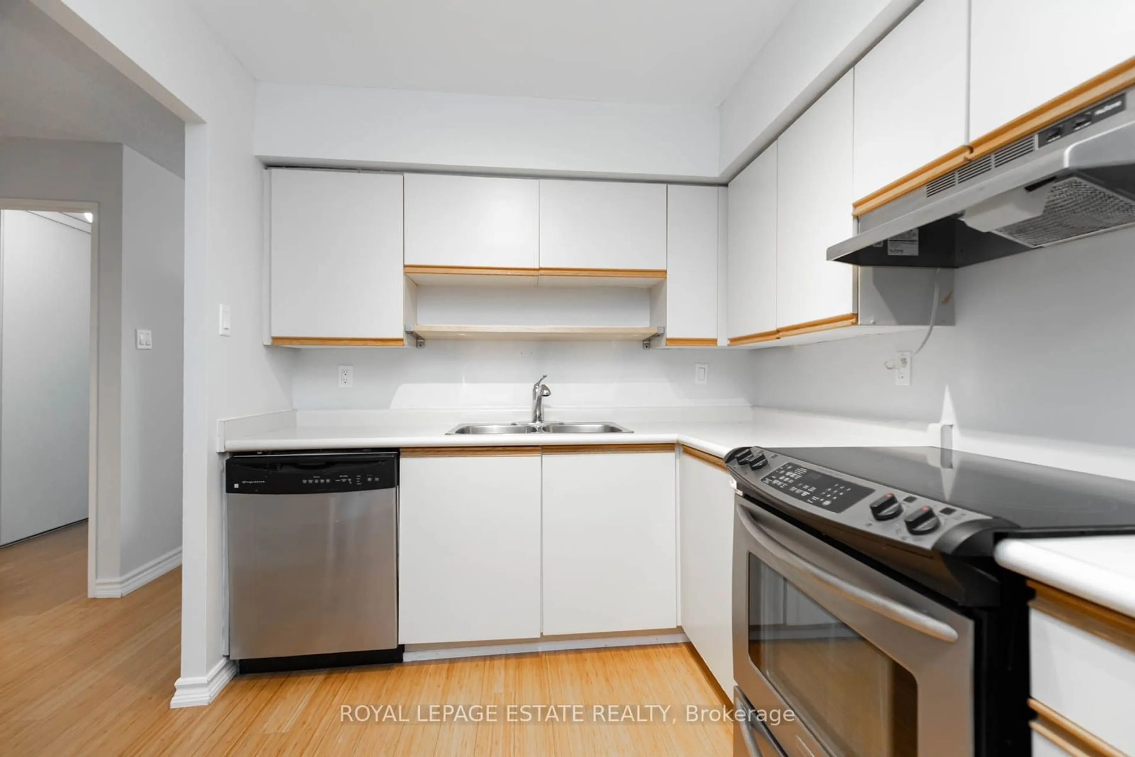 Standard kitchen, wood/laminate floor for 4 Park Vista Dr #604, Toronto Ontario M4B 3M8