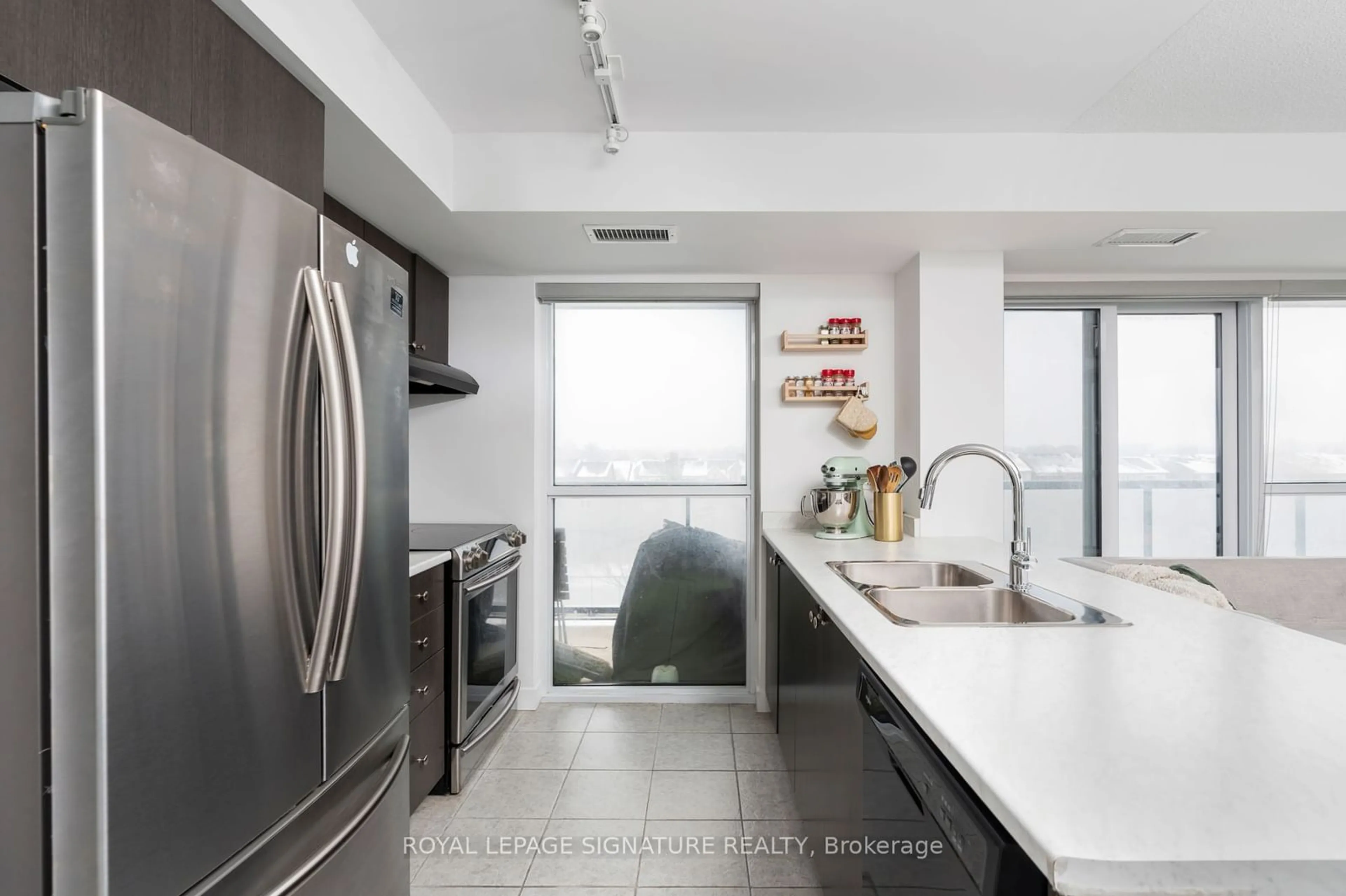 Contemporary kitchen, ceramic/tile floor for 8 Trent Ave #523, Toronto Ontario M4C 5C6