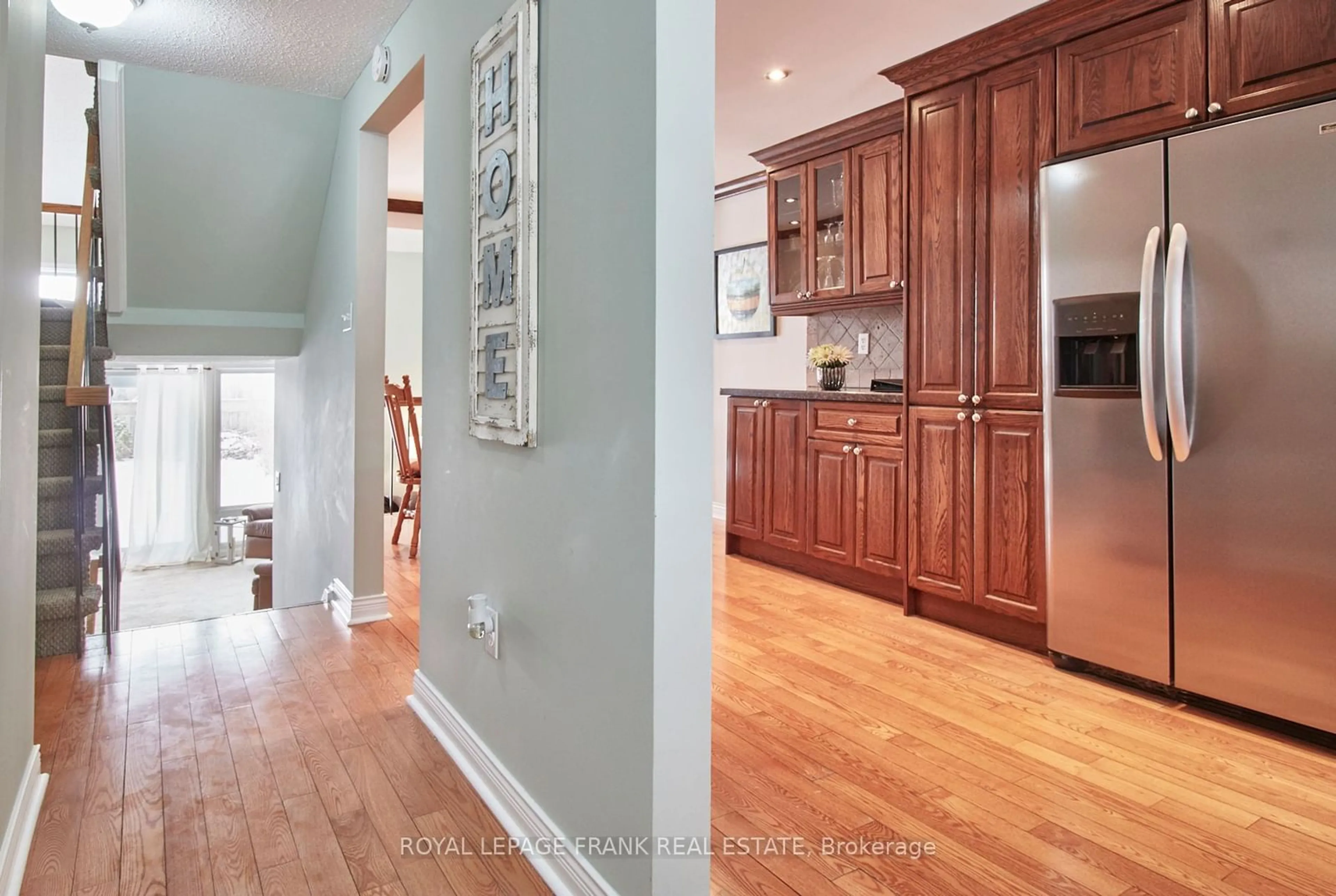 Open concept kitchen, wood/laminate floor for 1812 Listowell Cres, Pickering Ontario L1V 2Y3