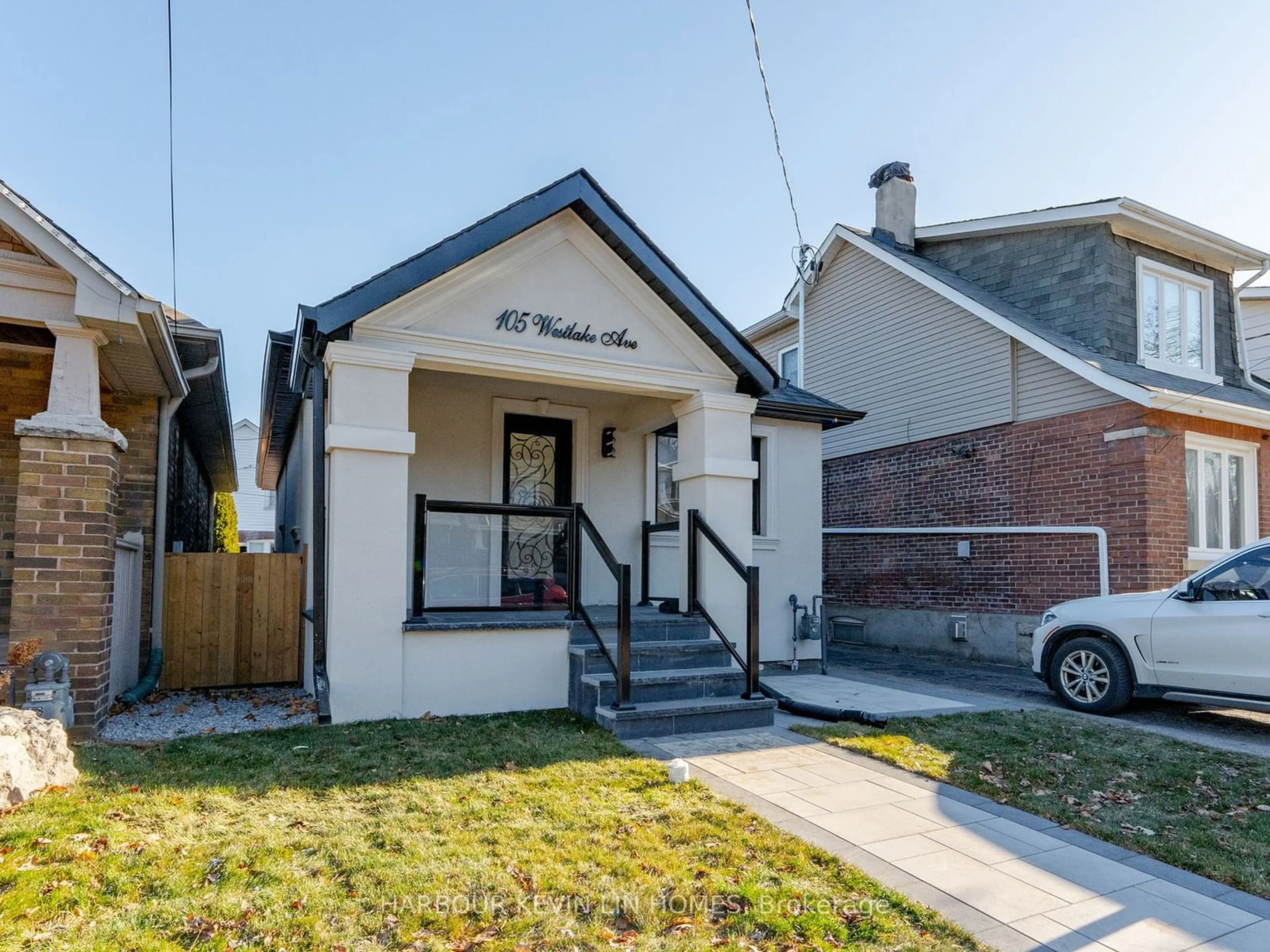 Home with brick exterior material, street for 105 Westlake Ave, Toronto Ontario M4C 4R3