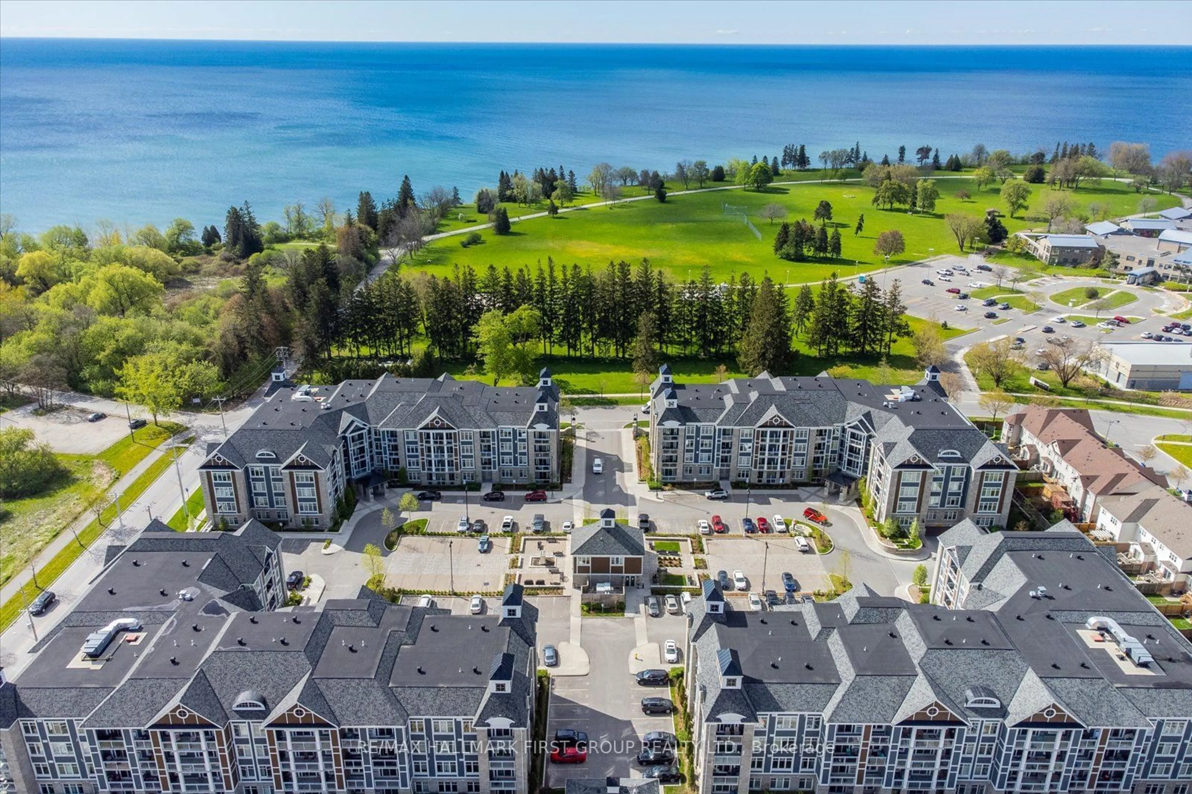 A pic from outside/outdoor area/front of a property/back of a property/a pic from drone, water/lake/river/ocean view for 680 Gordon St #311, Whitby Ontario L1N 0L2