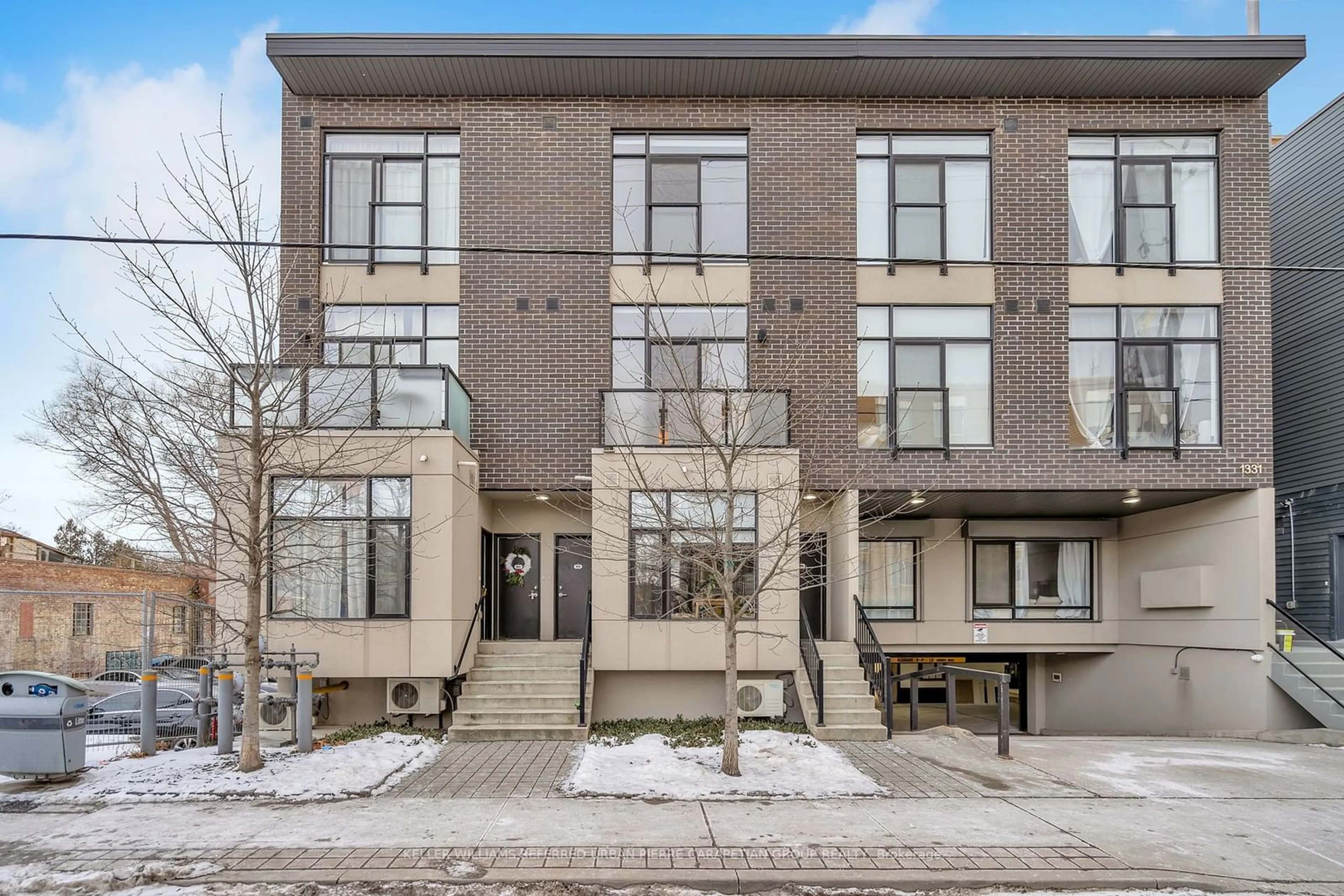 Home with brick exterior material, street for 1331 Gerrard Ave #3, Toronto Ontario M4L 1Y8