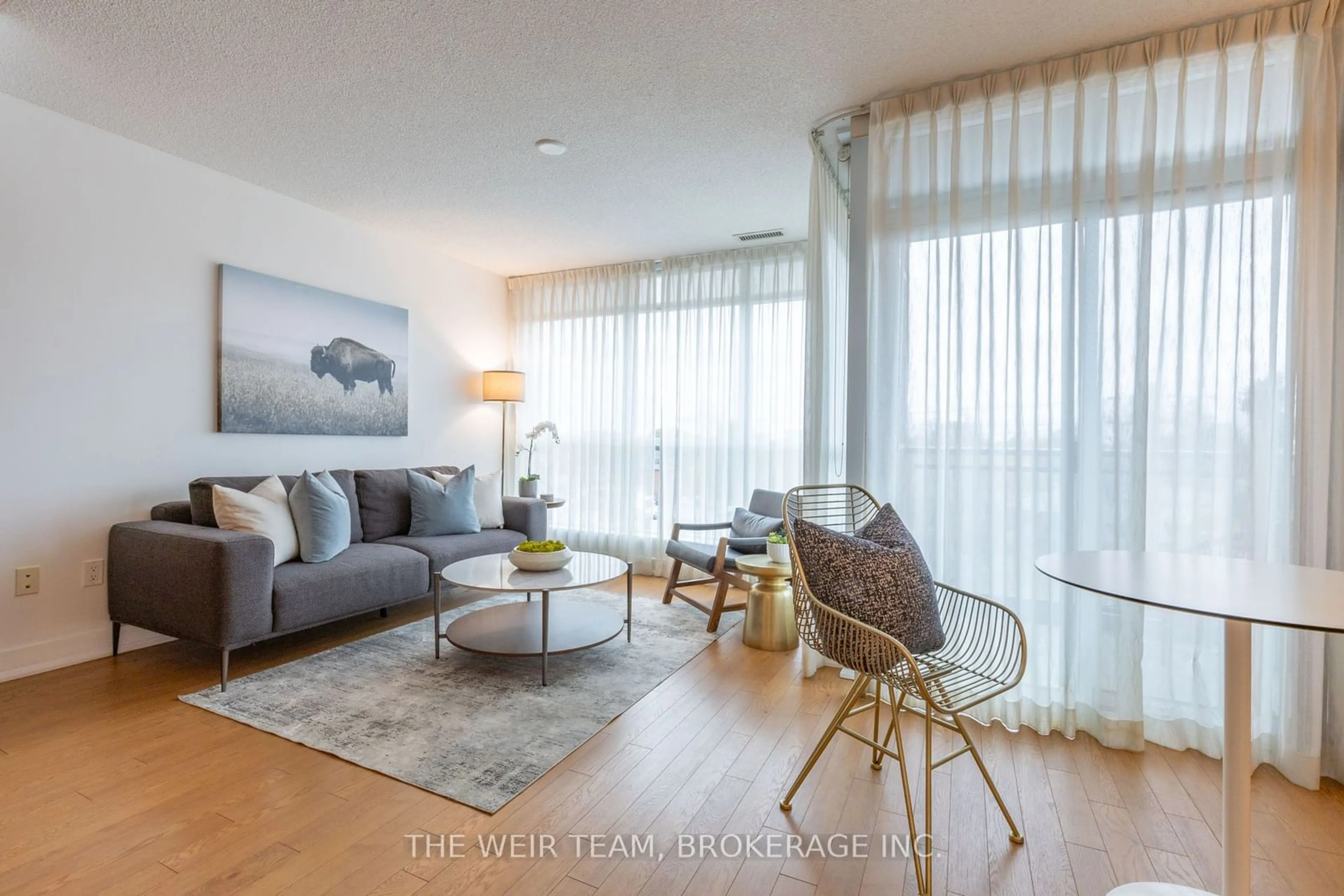 Living room with furniture, wood/laminate floor for 1048 Broadview Ave #505, Toronto Ontario M4K 2B8