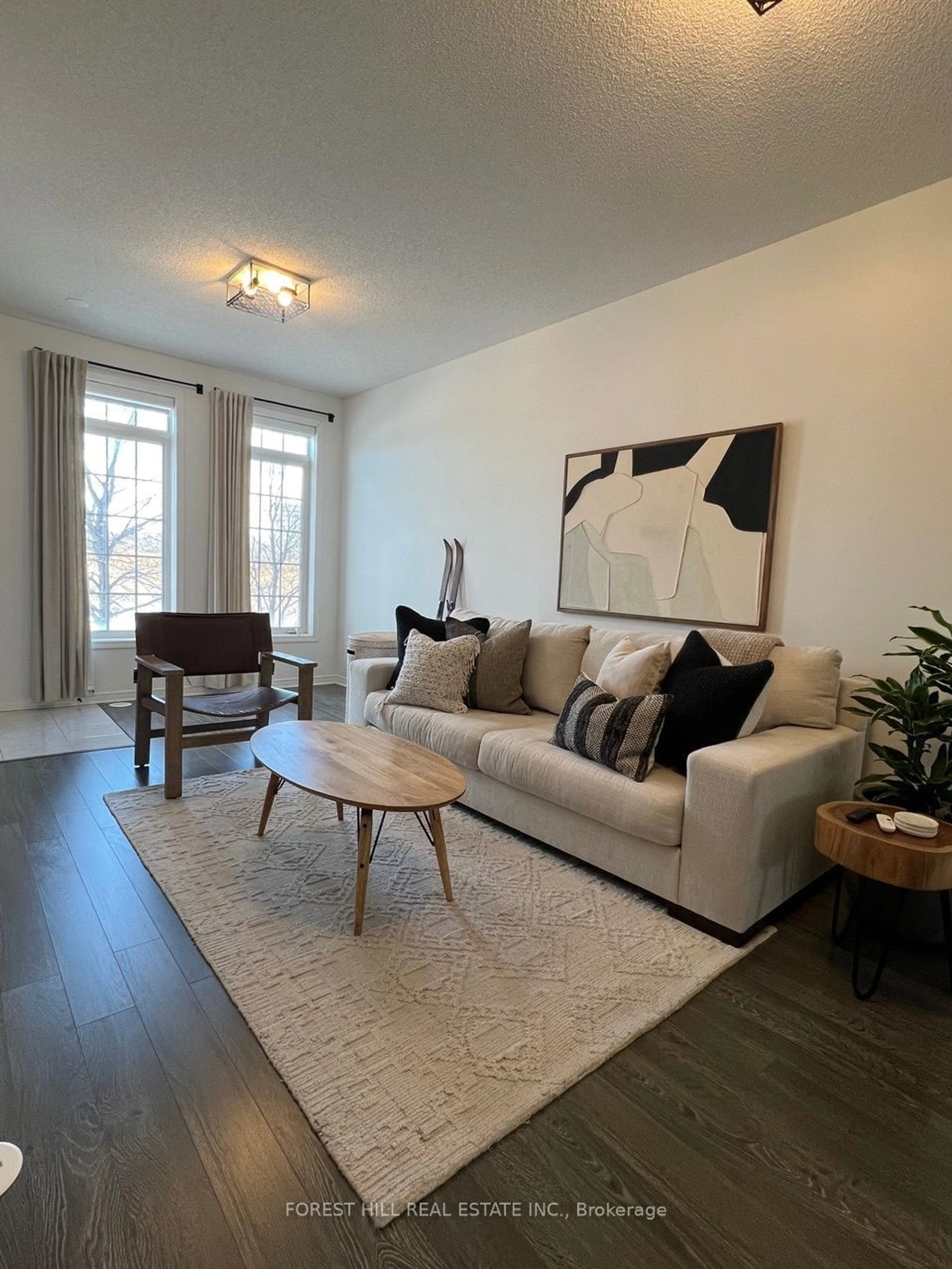 Living room with furniture, wood/laminate floor for 35 Island Rd #3, Toronto Ontario M1C 0E4