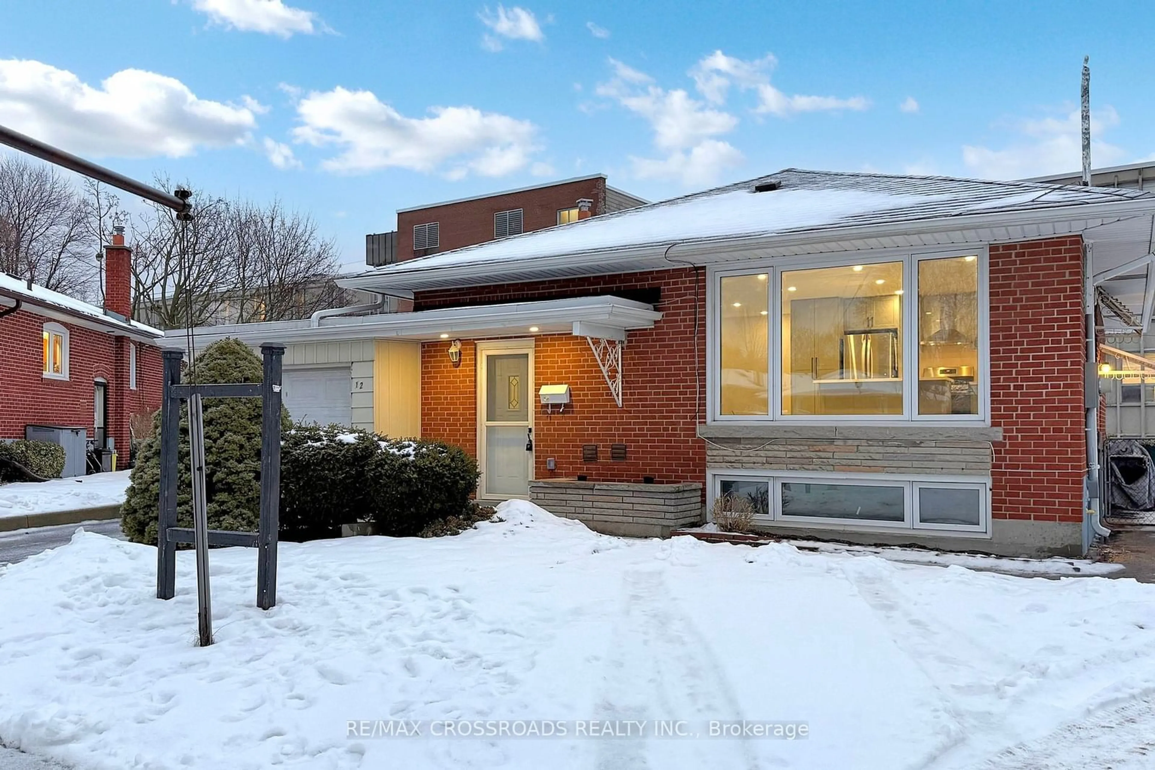 Home with brick exterior material, street for 12 Biltmore Crt, Toronto Ontario M1J 1Y4