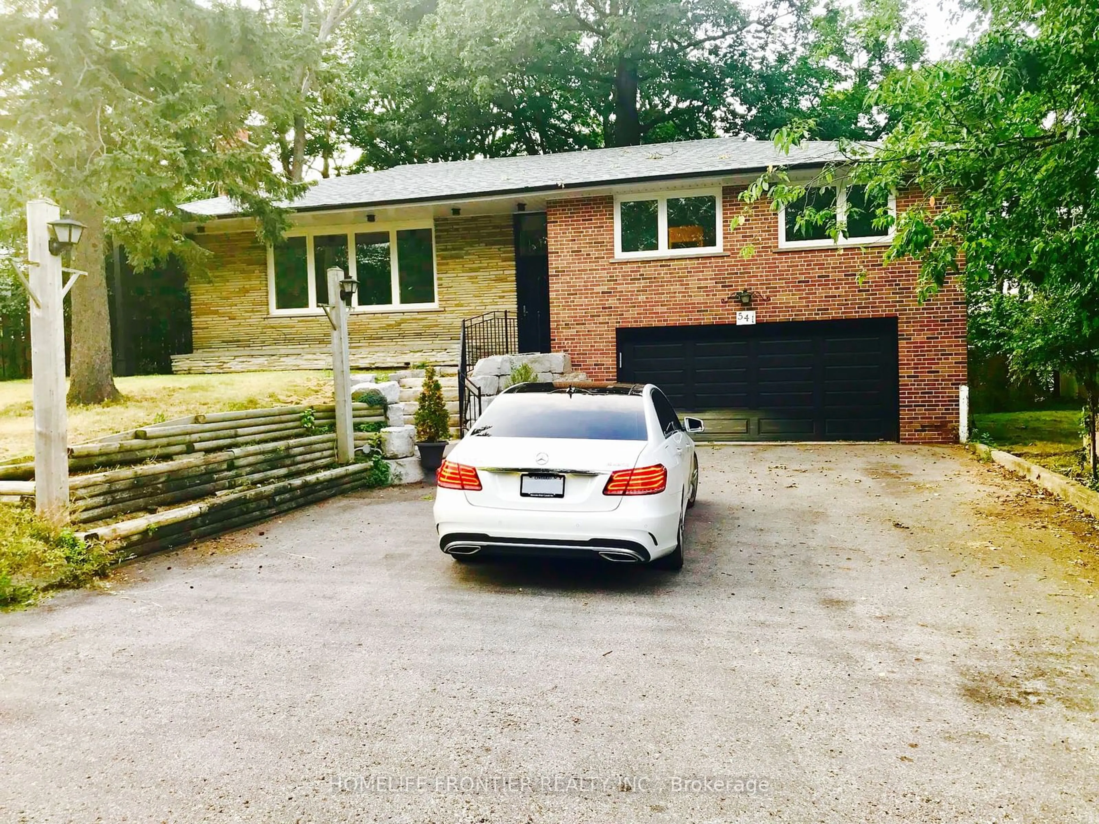 A pic from outside/outdoor area/front of a property/back of a property/a pic from drone, street for 541 Rouge Hills Dr, Toronto Ontario M1C 2Z9