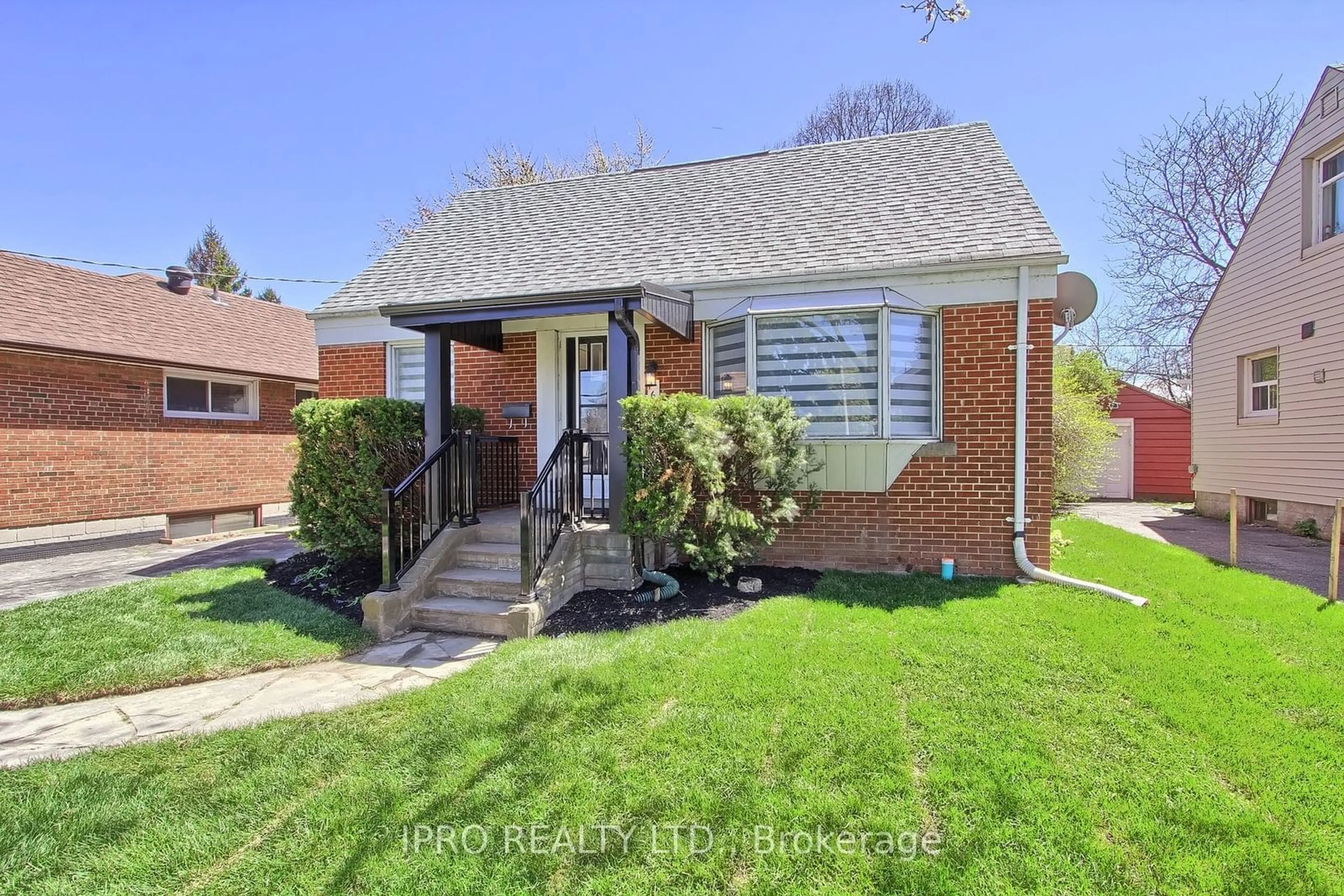 Home with brick exterior material, street for 165 Ellesmere Rd, Toronto Ontario M1R 4C7