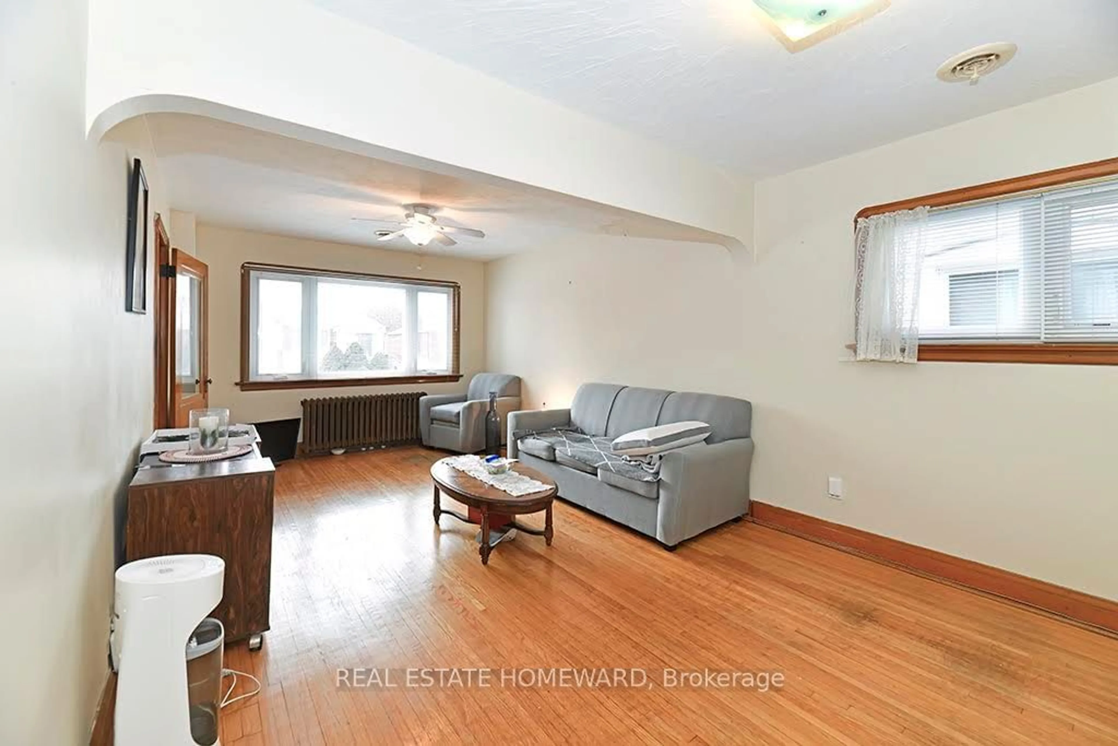 Living room with furniture, wood/laminate floor for 6 Joanith Dr, Toronto Ontario M4B 1S7