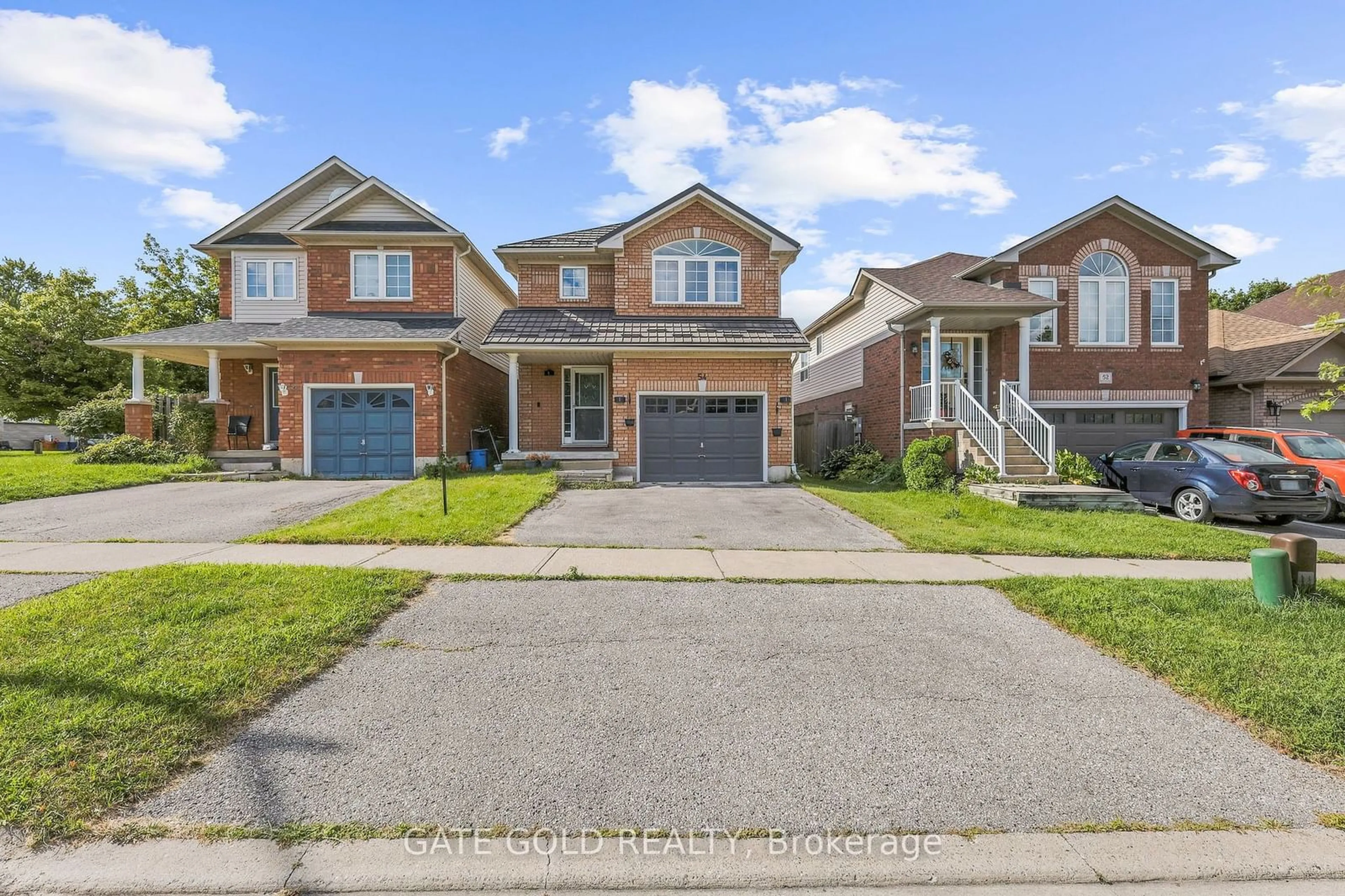 Home with brick exterior material, street for 54 Marchwood Cres, Clarington Ontario L1C 5K5