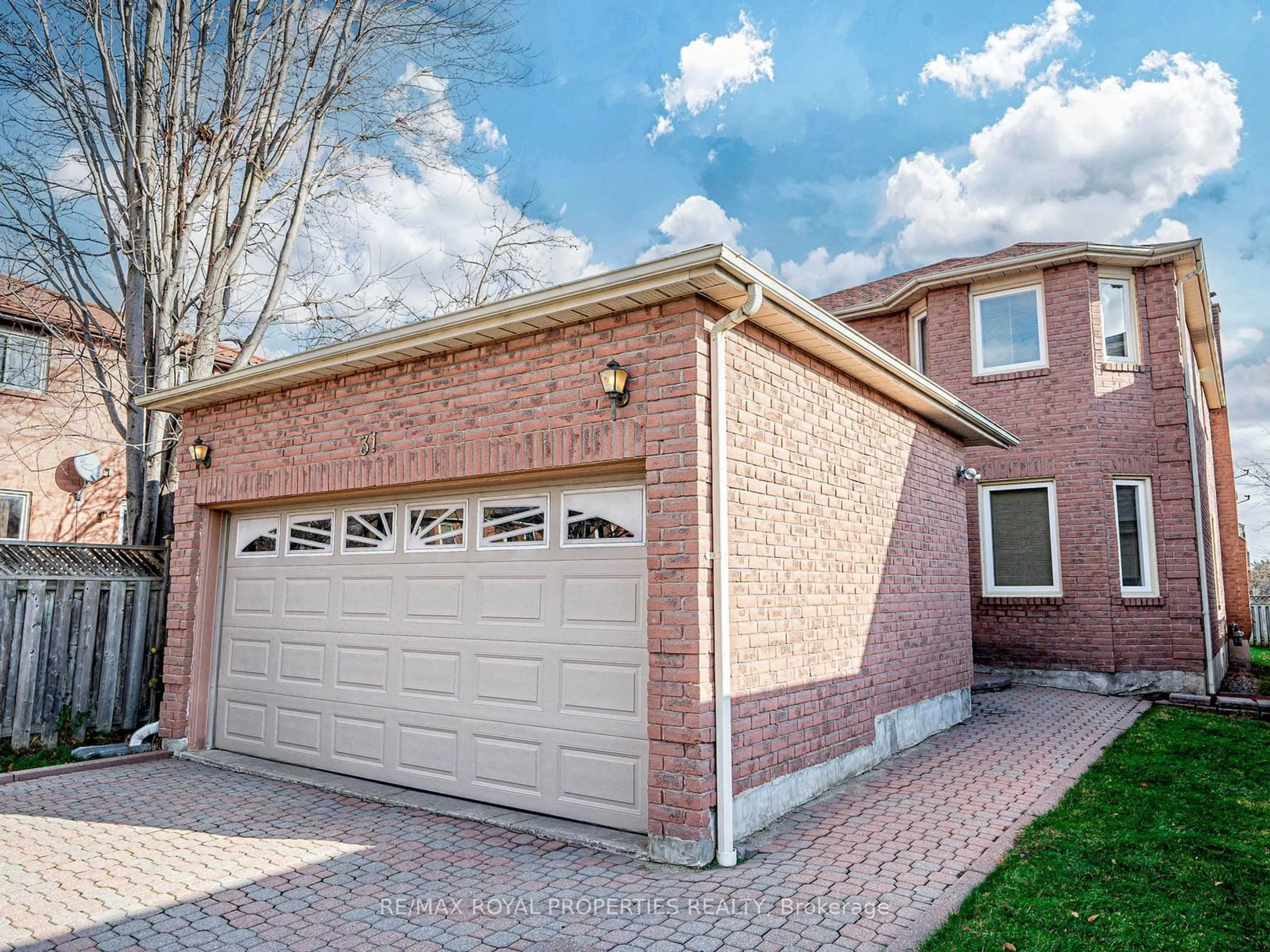 Home with brick exterior material, street for 31 Orleans Dr, Toronto Ontario L3S 0E6