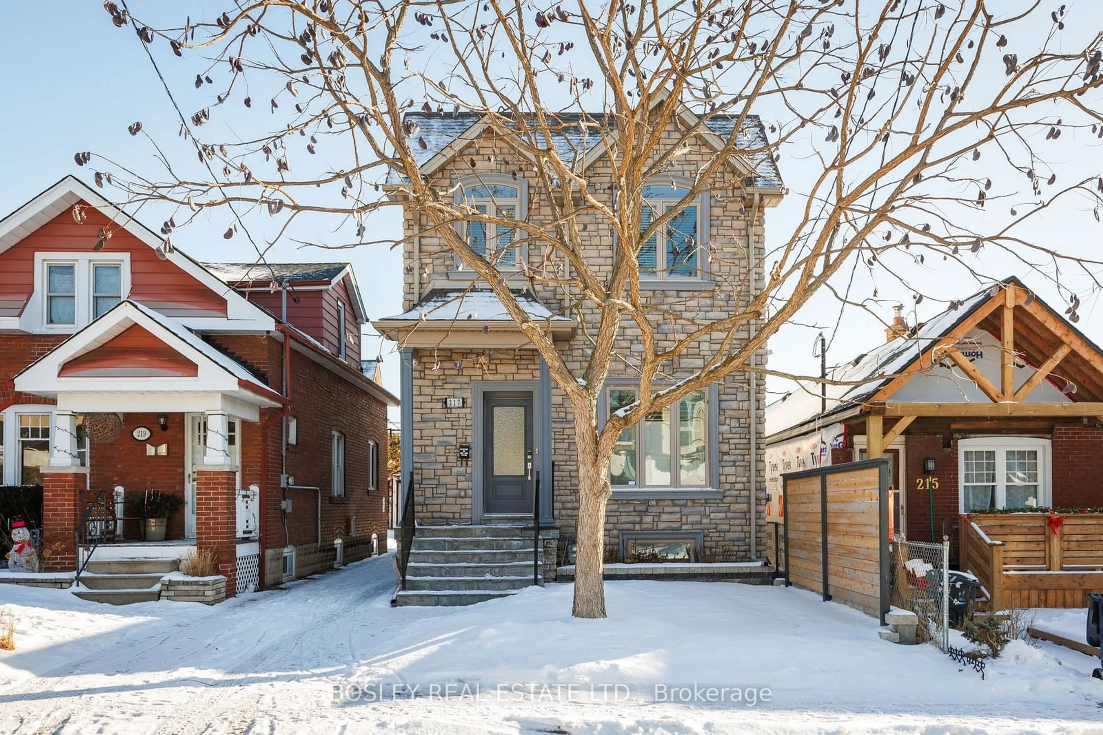 Home with brick exterior material, street for 217 Woodmount Ave, Toronto Ontario M4C 3Z7