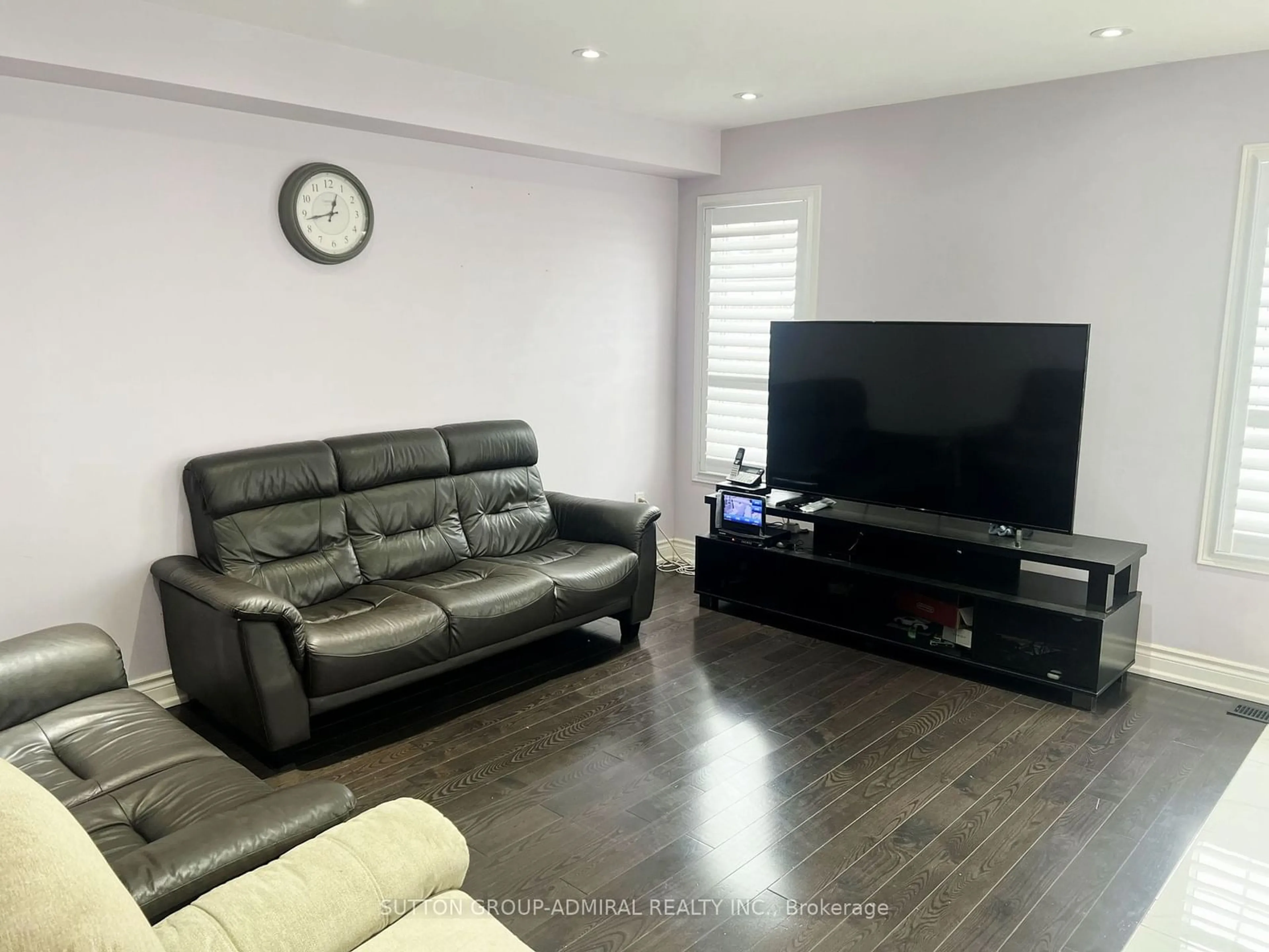 Living room with furniture, wood/laminate floor for 1421 Rennie St, Oshawa Ontario L1K 0N8