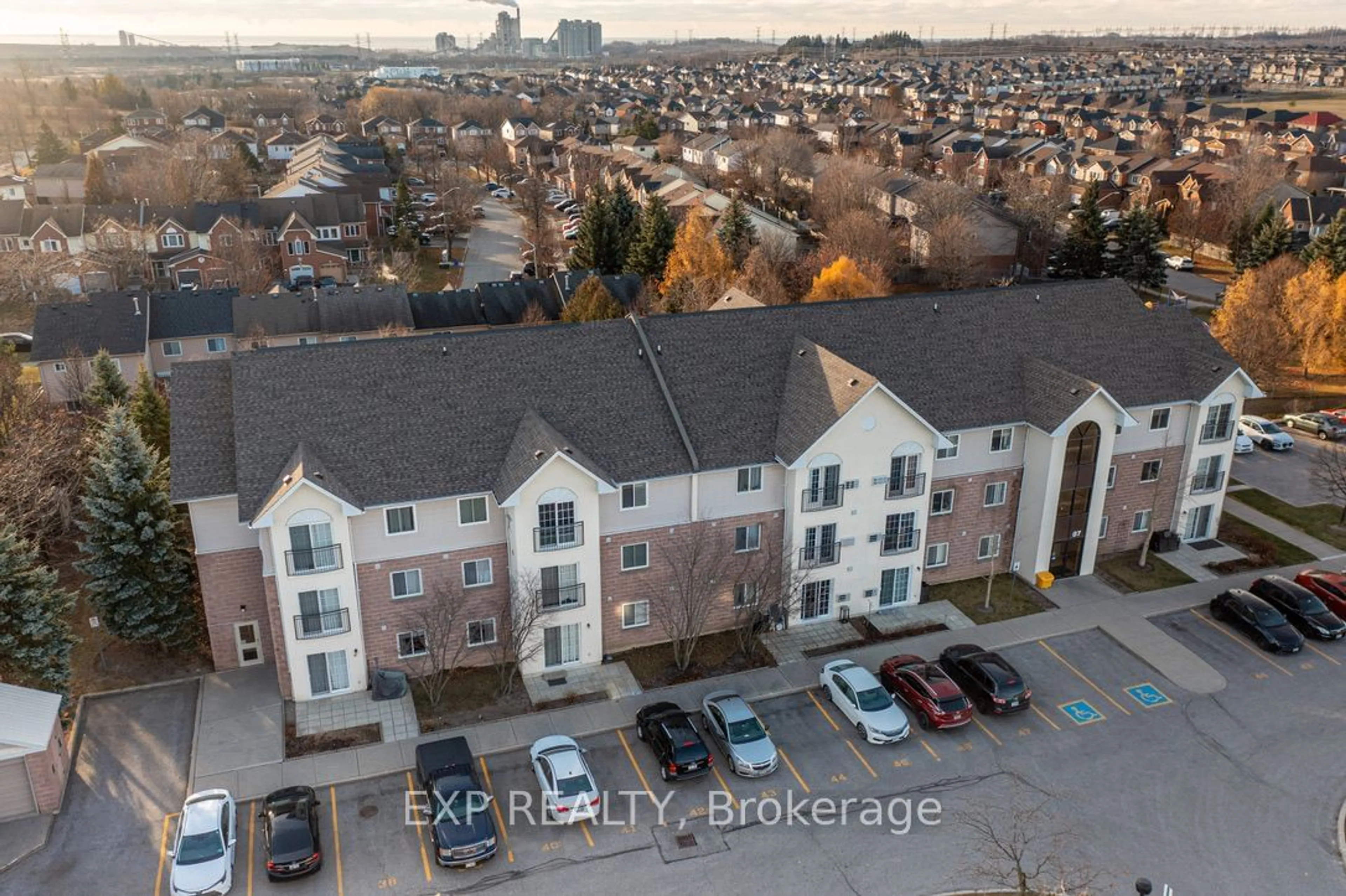 A pic from outside/outdoor area/front of a property/back of a property/a pic from drone, city buildings view from balcony for 87 Aspen Springs Dr #207, Clarington Ontario L1C 5J8