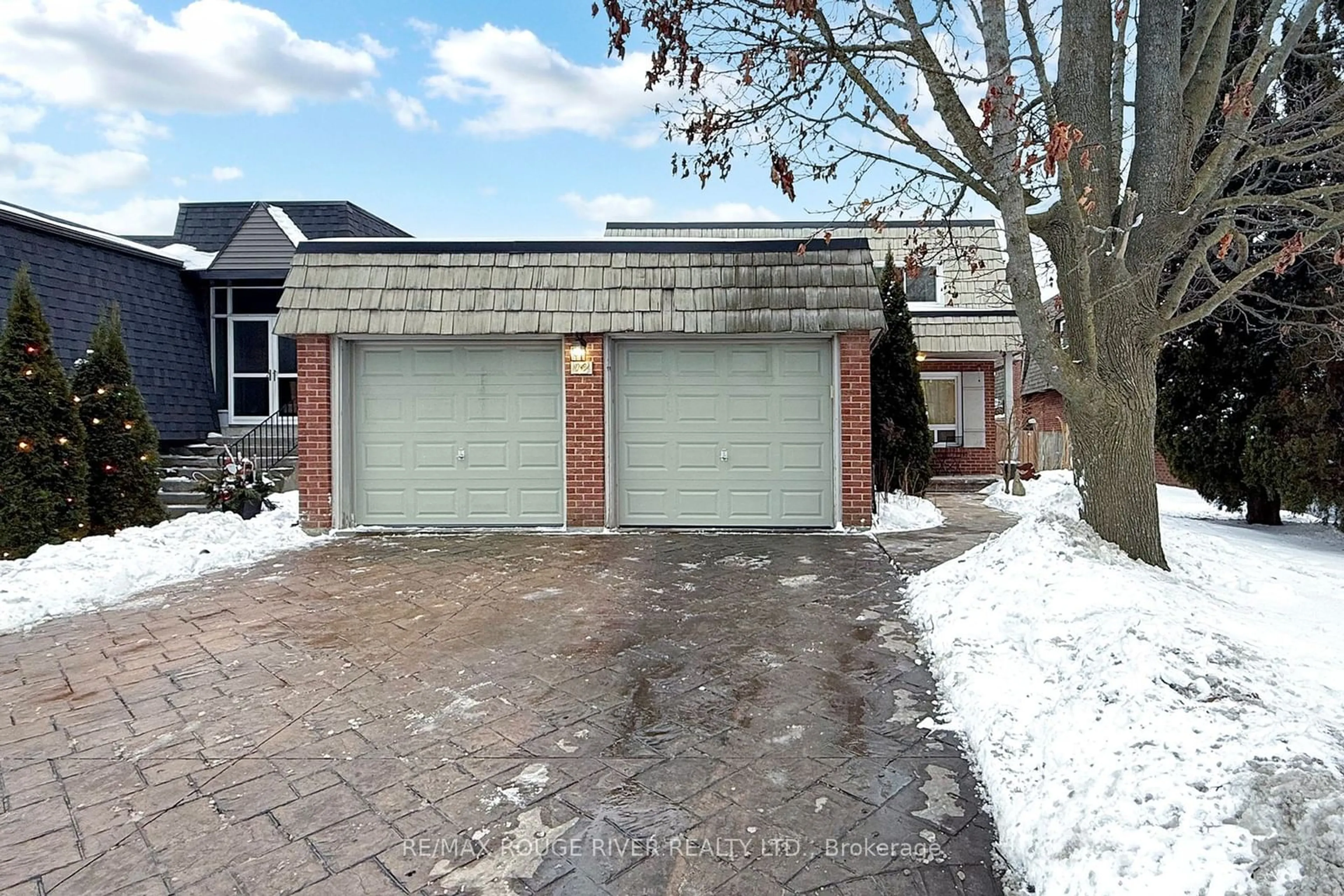 Home with brick exterior material, street for 12 McGrath Crt, Toronto Ontario M1C 3B5