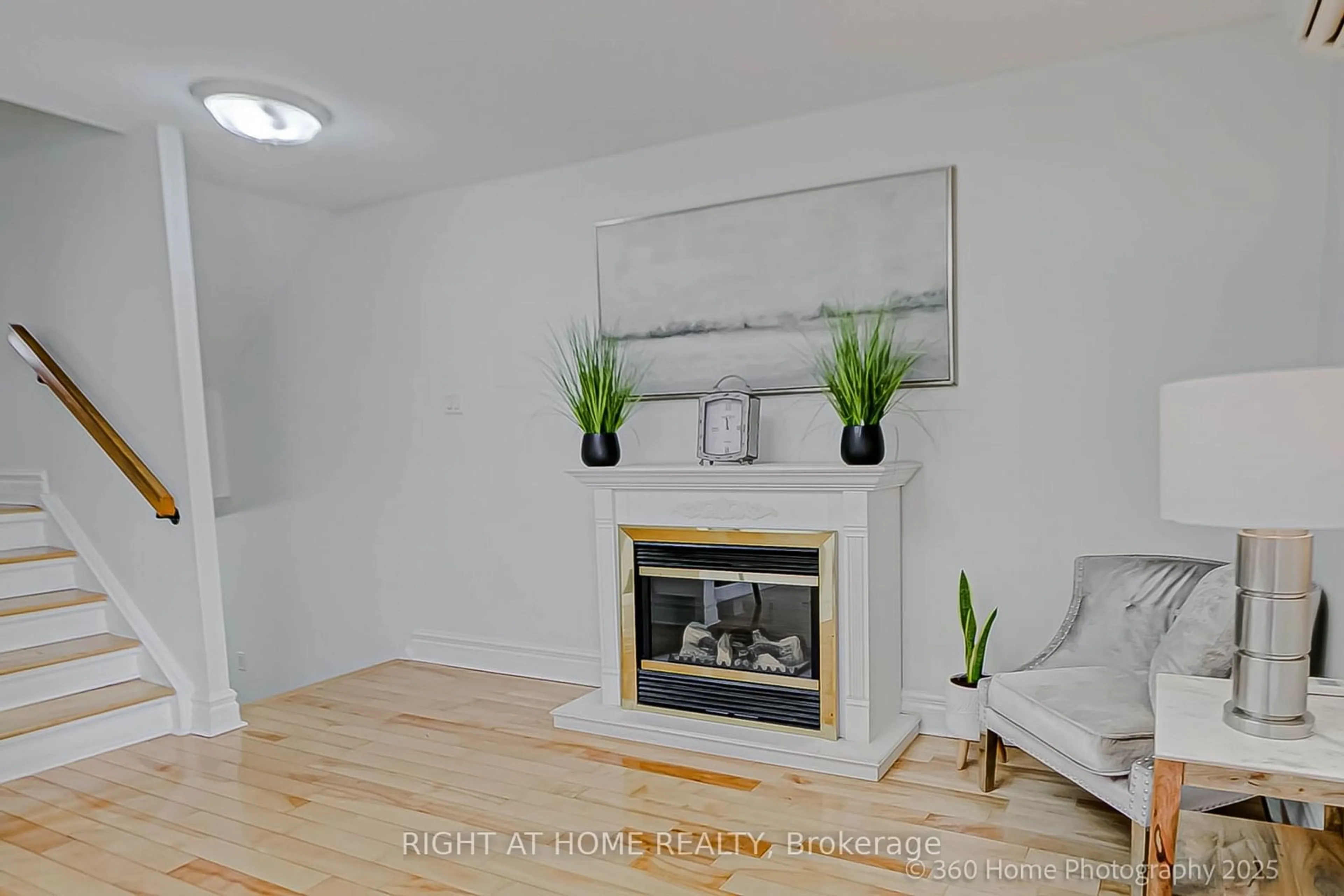 Living room with furniture, wood/laminate floor for 2020 Pharmacy Ave #8, Toronto Ontario M1T 1H8