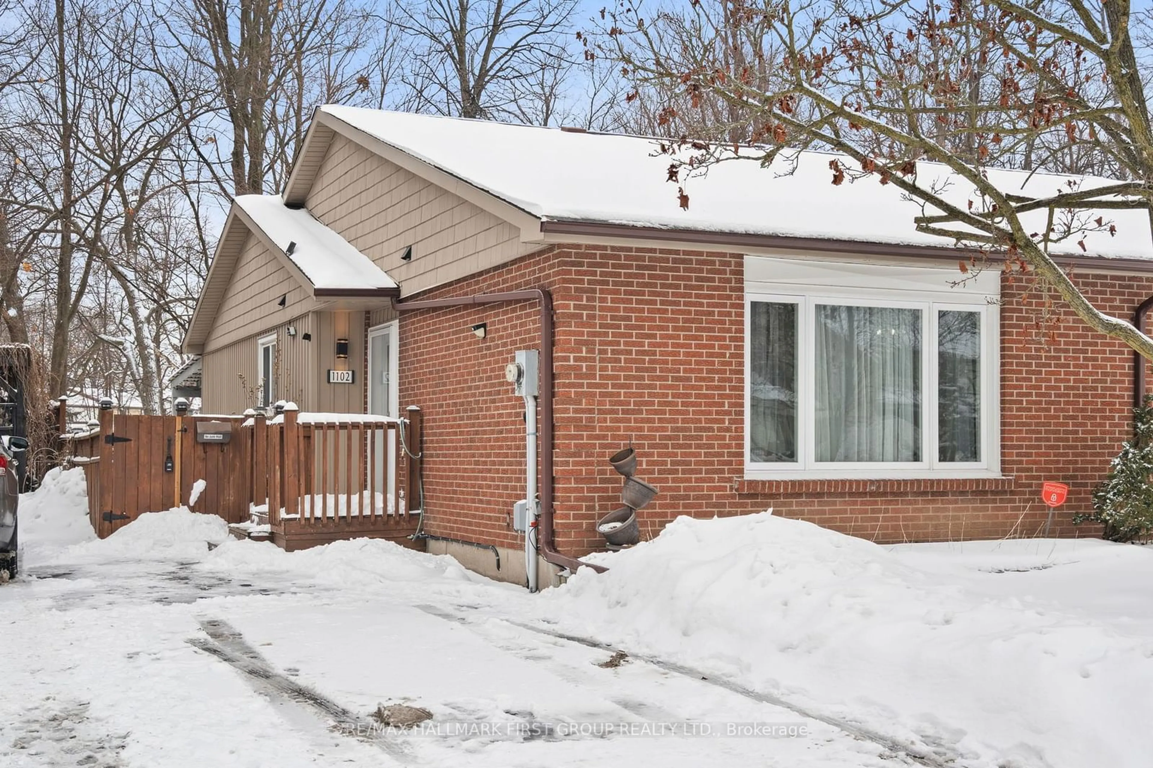 Home with brick exterior material, street for 1102 Central Park Blvd, Oshawa Ontario L1G 7G8