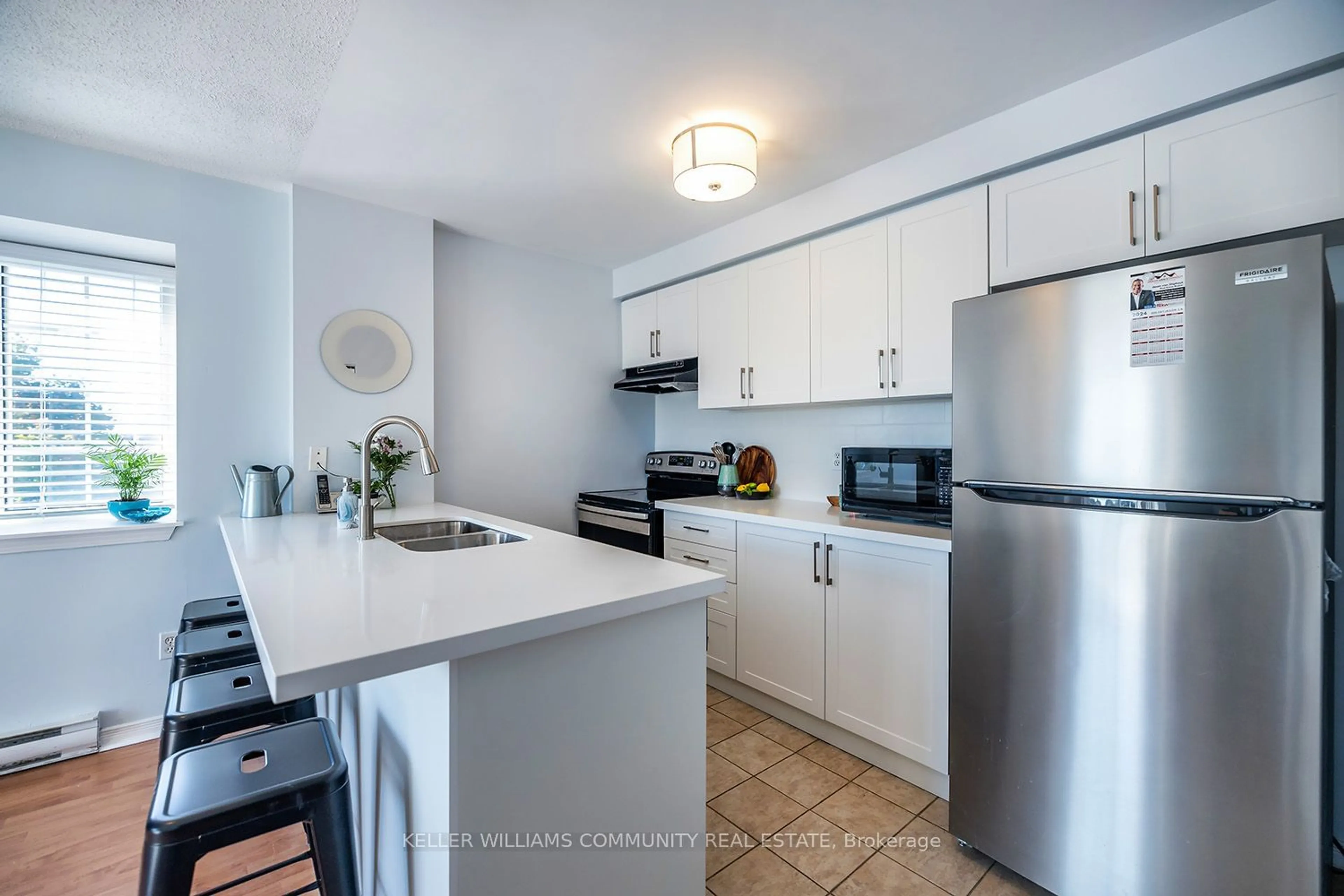 Standard kitchen, ceramic/tile floor for 91 Aspen Springs Dr #301, Clarington Ontario L1C 5J9