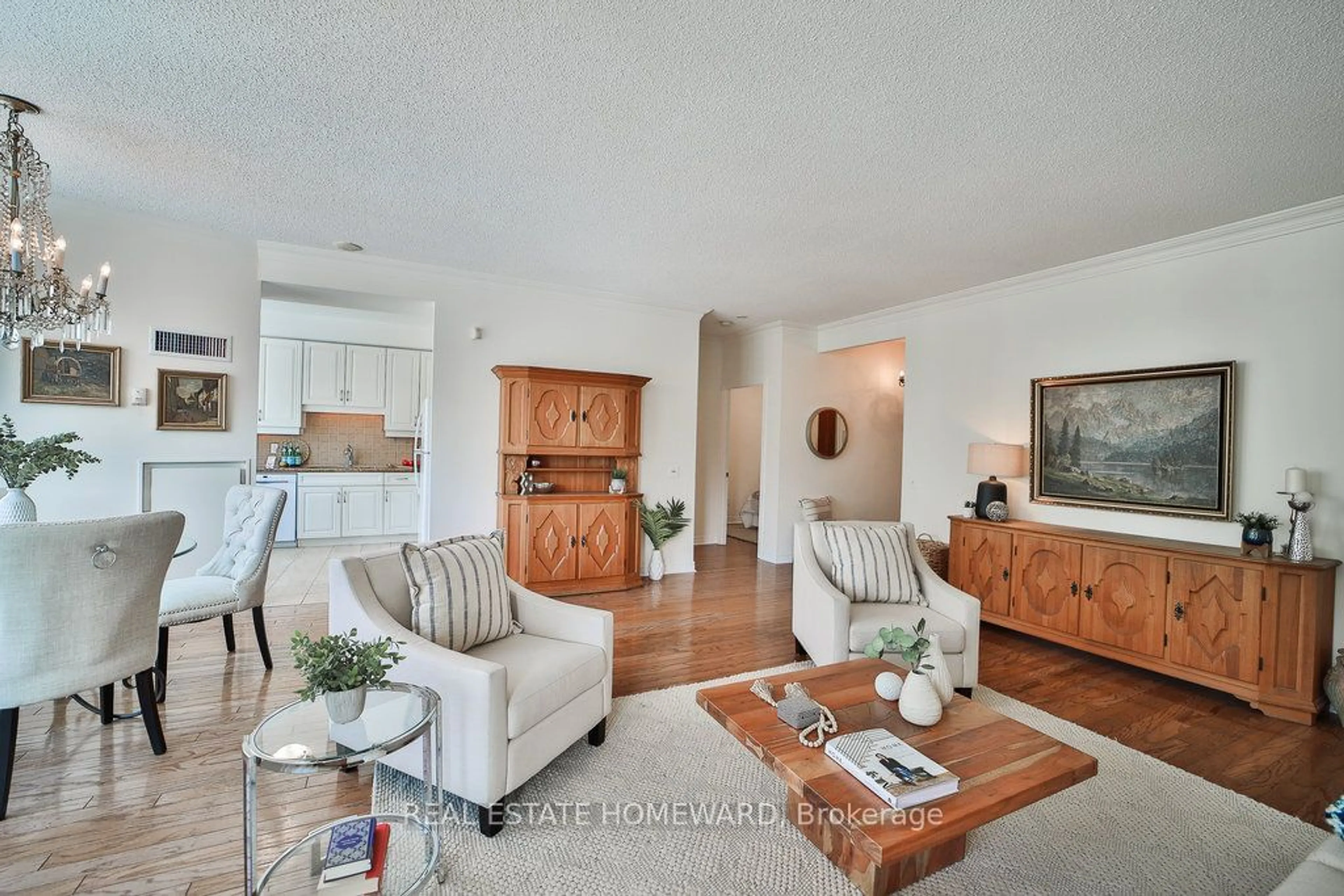 Living room with furniture, wood/laminate floor for 9 Boardwalk Dr #313, Toronto Ontario M4L 6T1