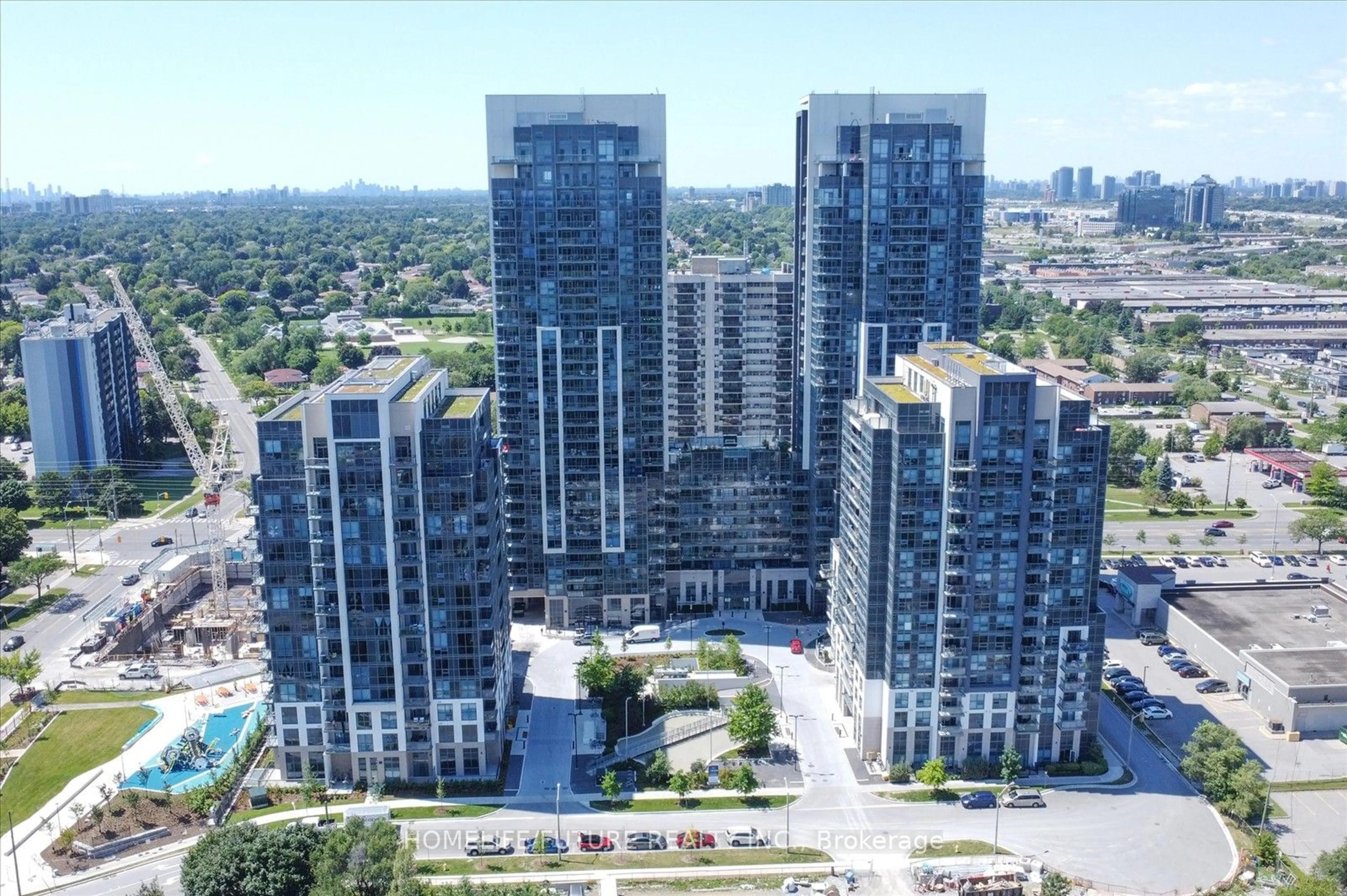 A pic from outside/outdoor area/front of a property/back of a property/a pic from drone, city buildings view from balcony for 30 Meadowglen Pl #213, Toronto Ontario M1G 0A6