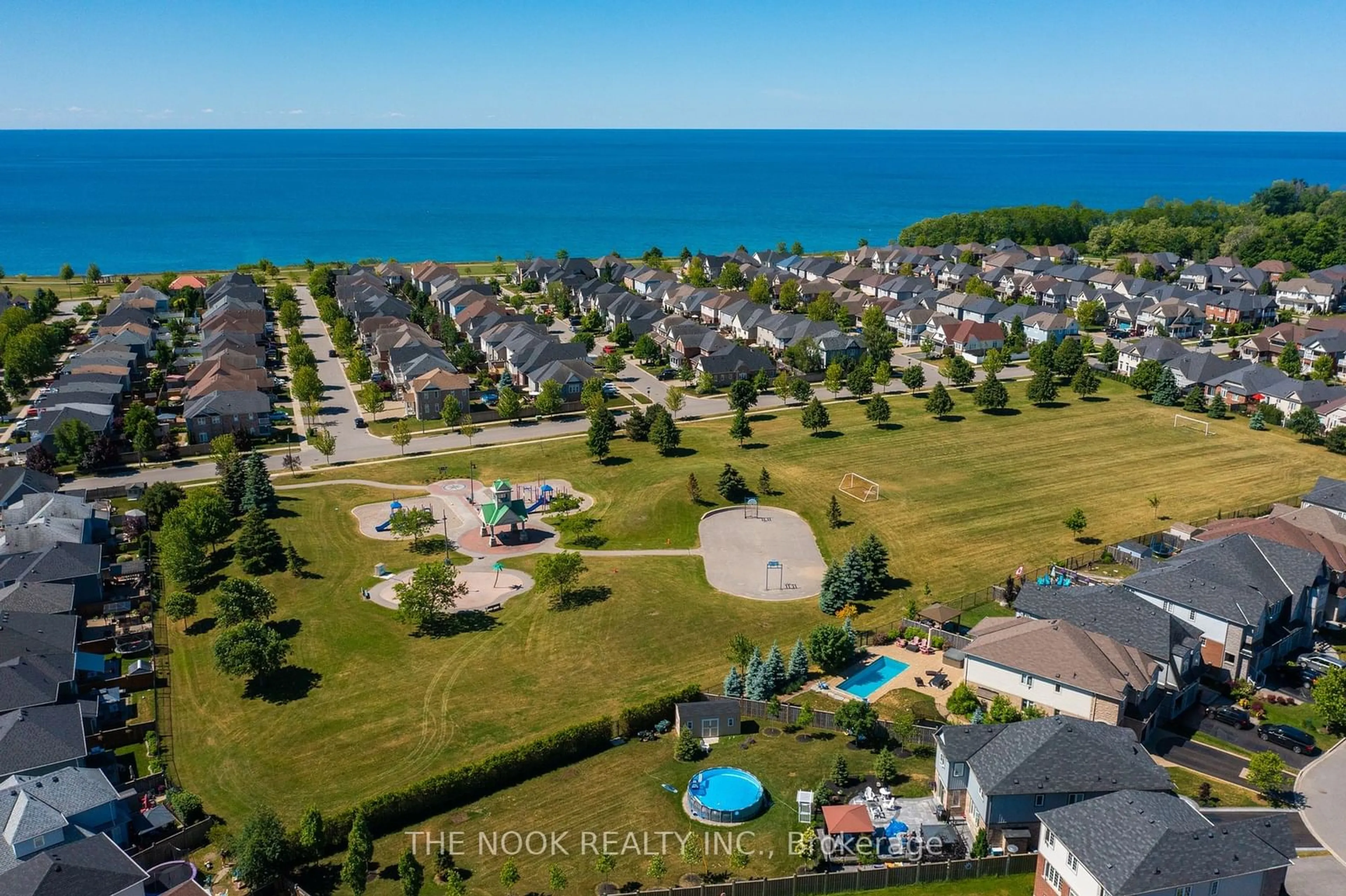 A pic from outside/outdoor area/front of a property/back of a property/a pic from drone, water/lake/river/ocean view for 39 Doug Walton Lane, Clarington Ontario L1B 0A9