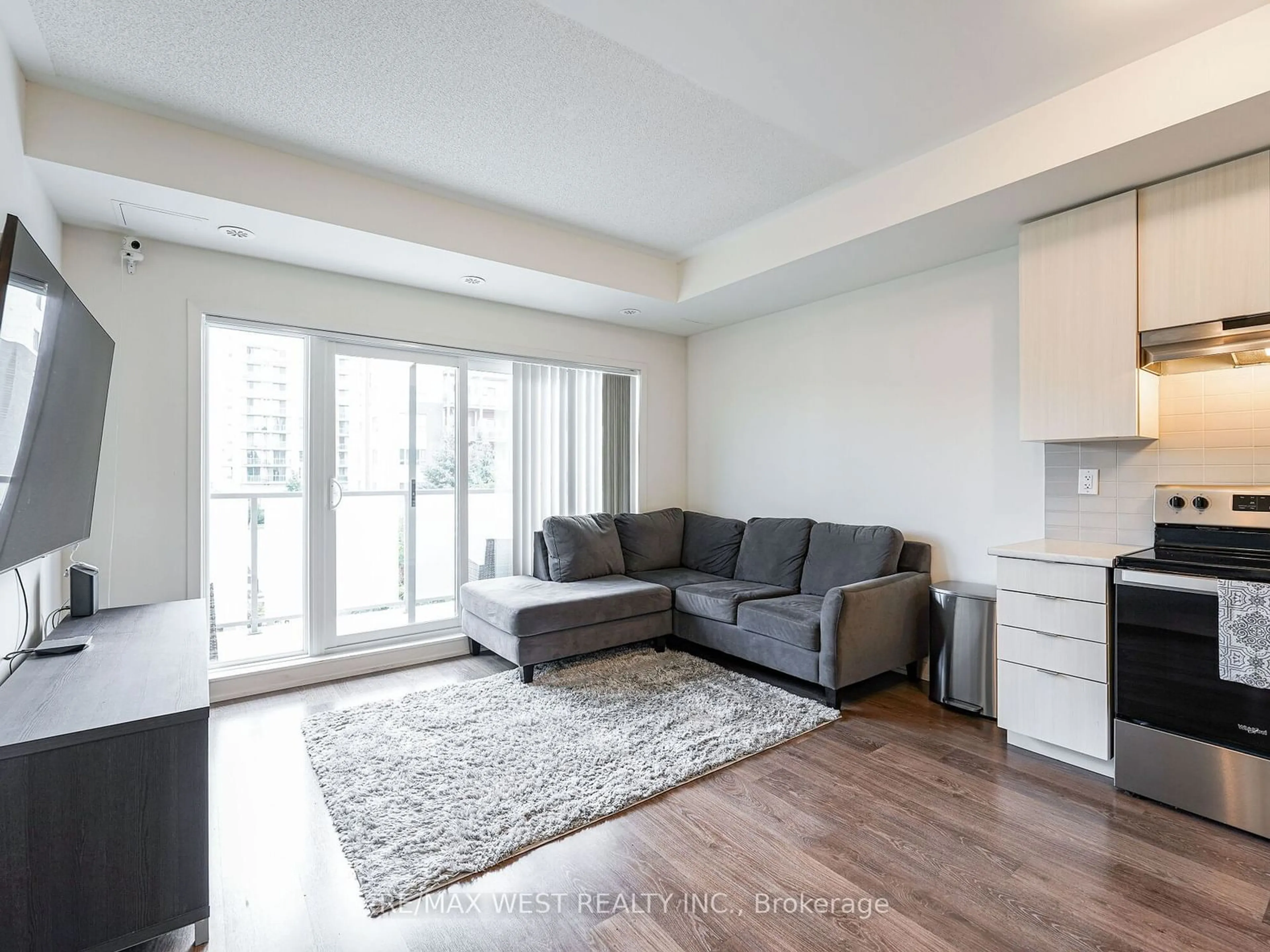 Living room with furniture, unknown for 5131 Sheppard Ave E #309, Toronto Ontario M1B 0C9