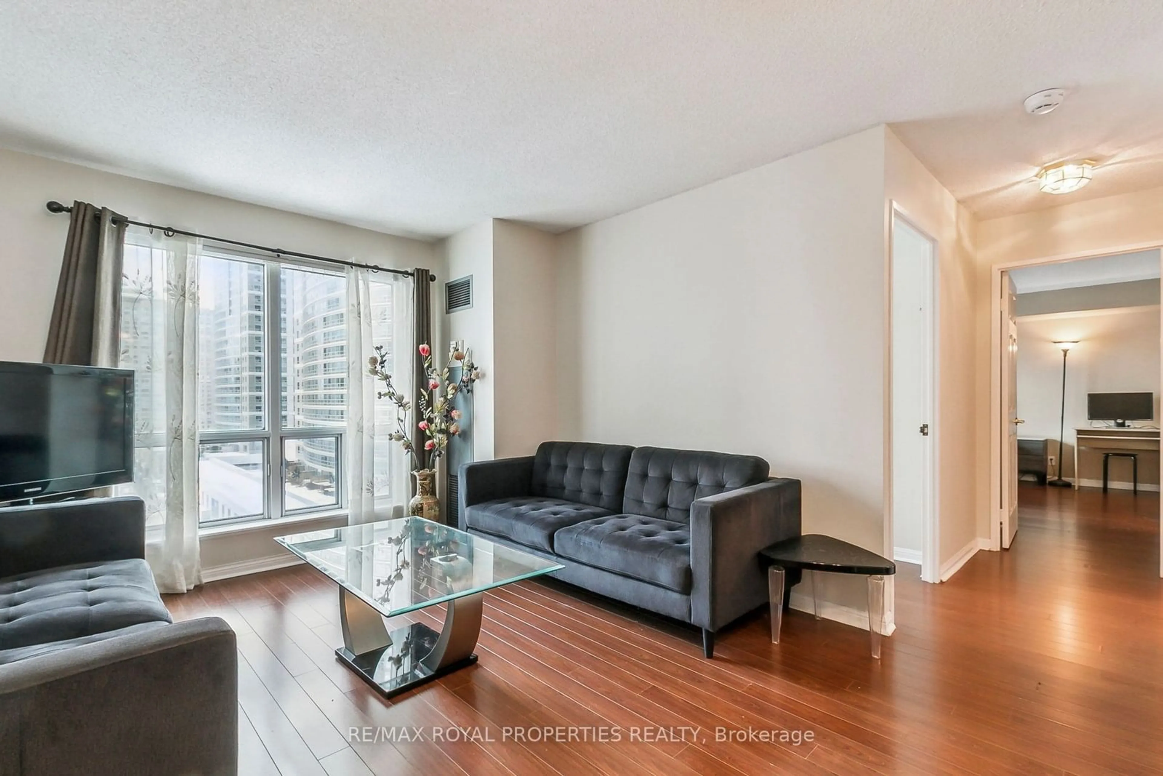 Living room with furniture, unknown for 11 Lee Centre Dr #1002, Toronto Ontario M1H 3J5