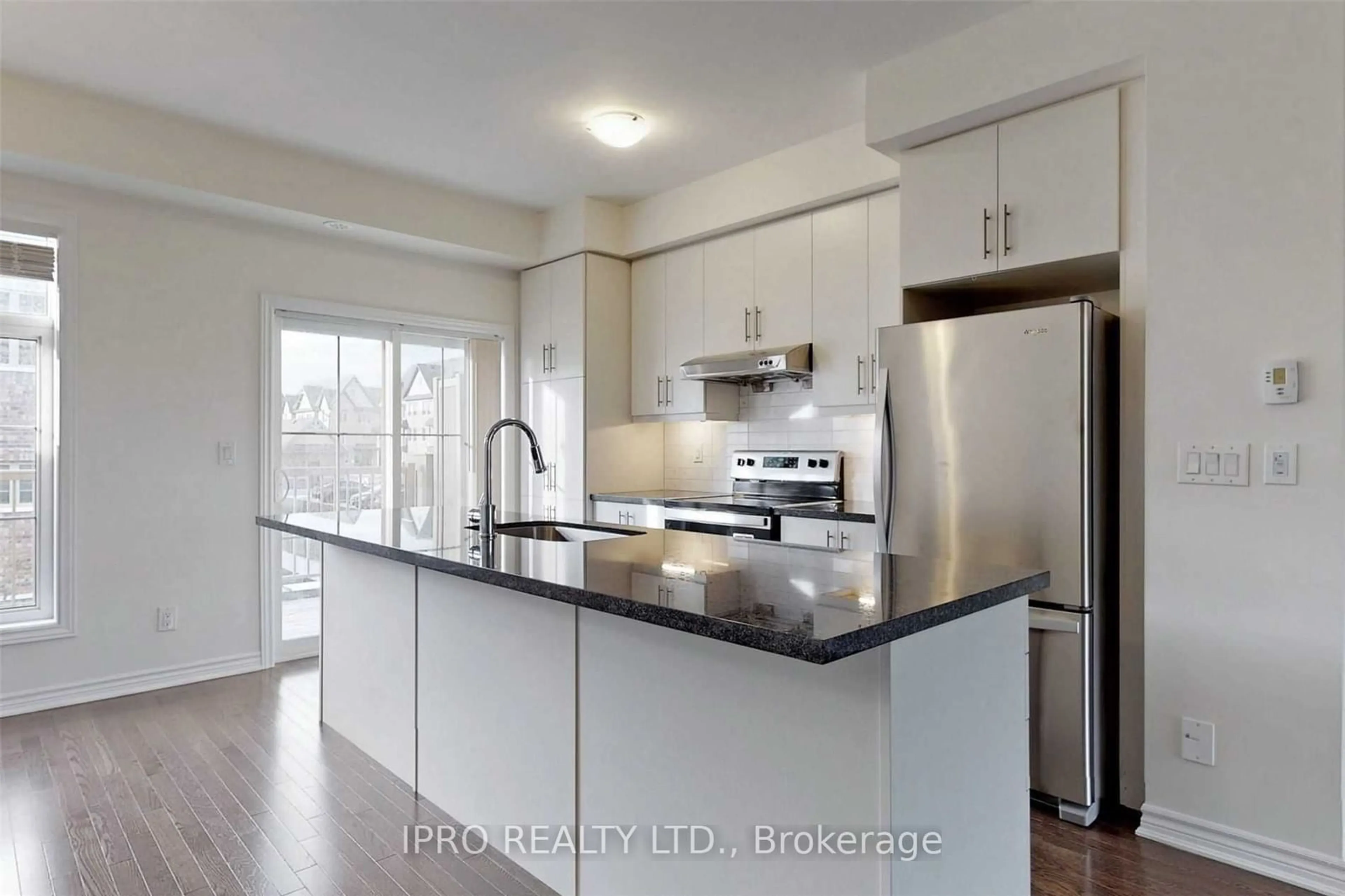 Open concept kitchen, wood/laminate floor for 11 Porcelain Way, Whitby Ontario L1R 0R6