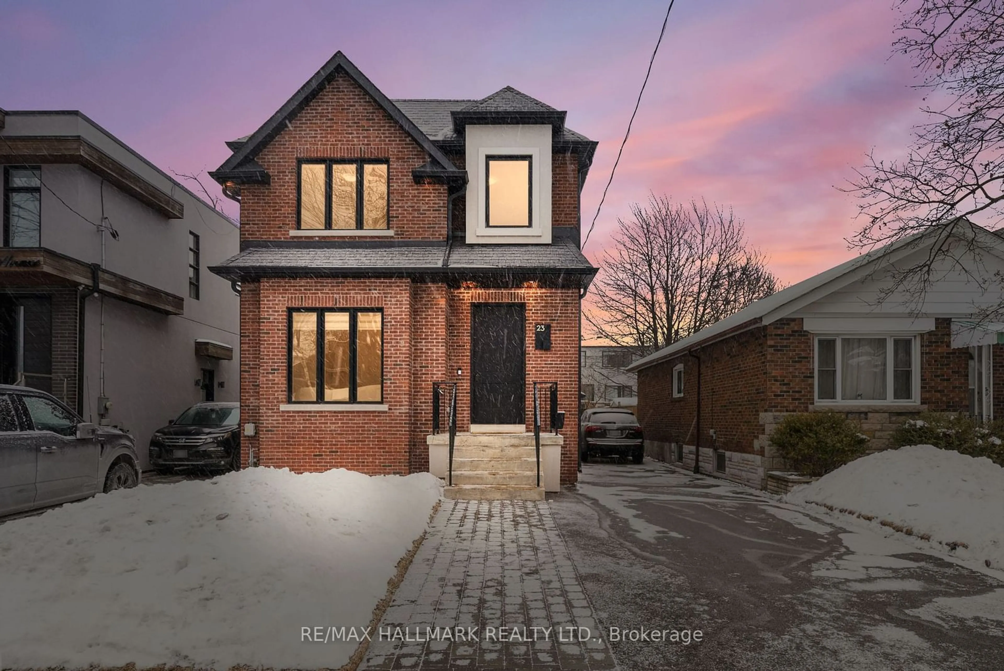 Home with brick exterior material, street for 23 Roblin Ave, Toronto Ontario M4C 3P7