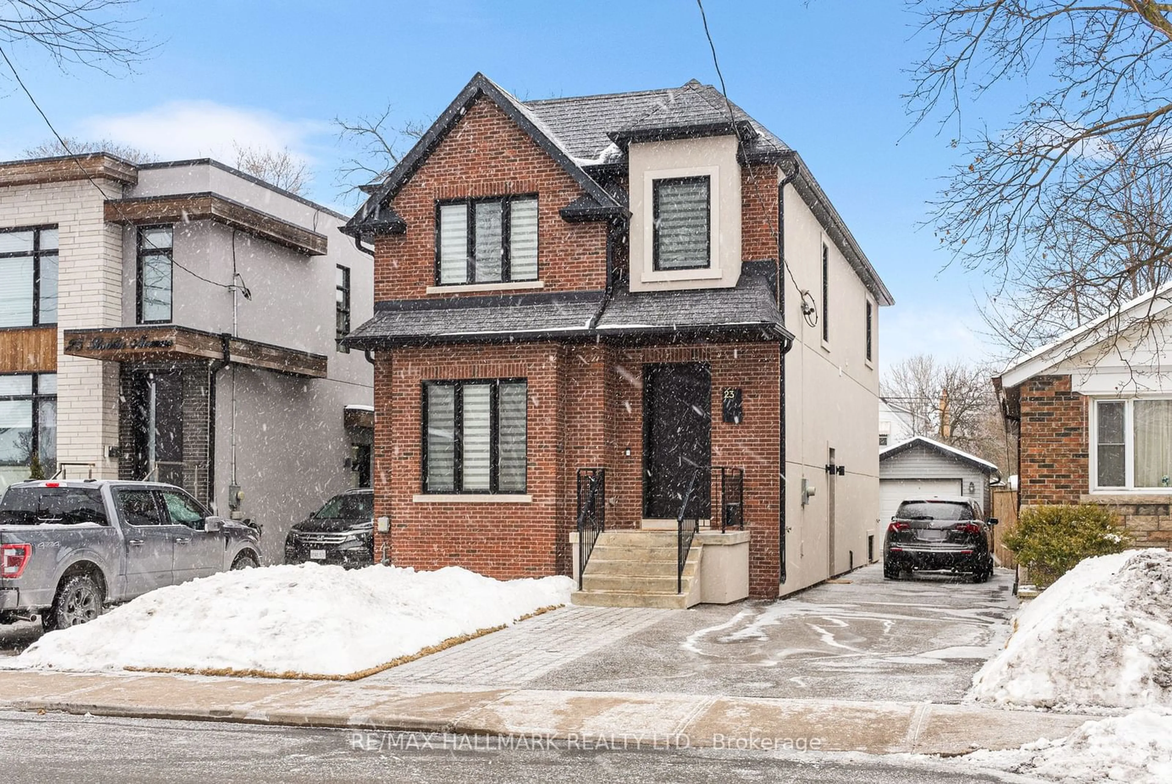 Home with brick exterior material, street for 23 Roblin Ave, Toronto Ontario M4C 3P7