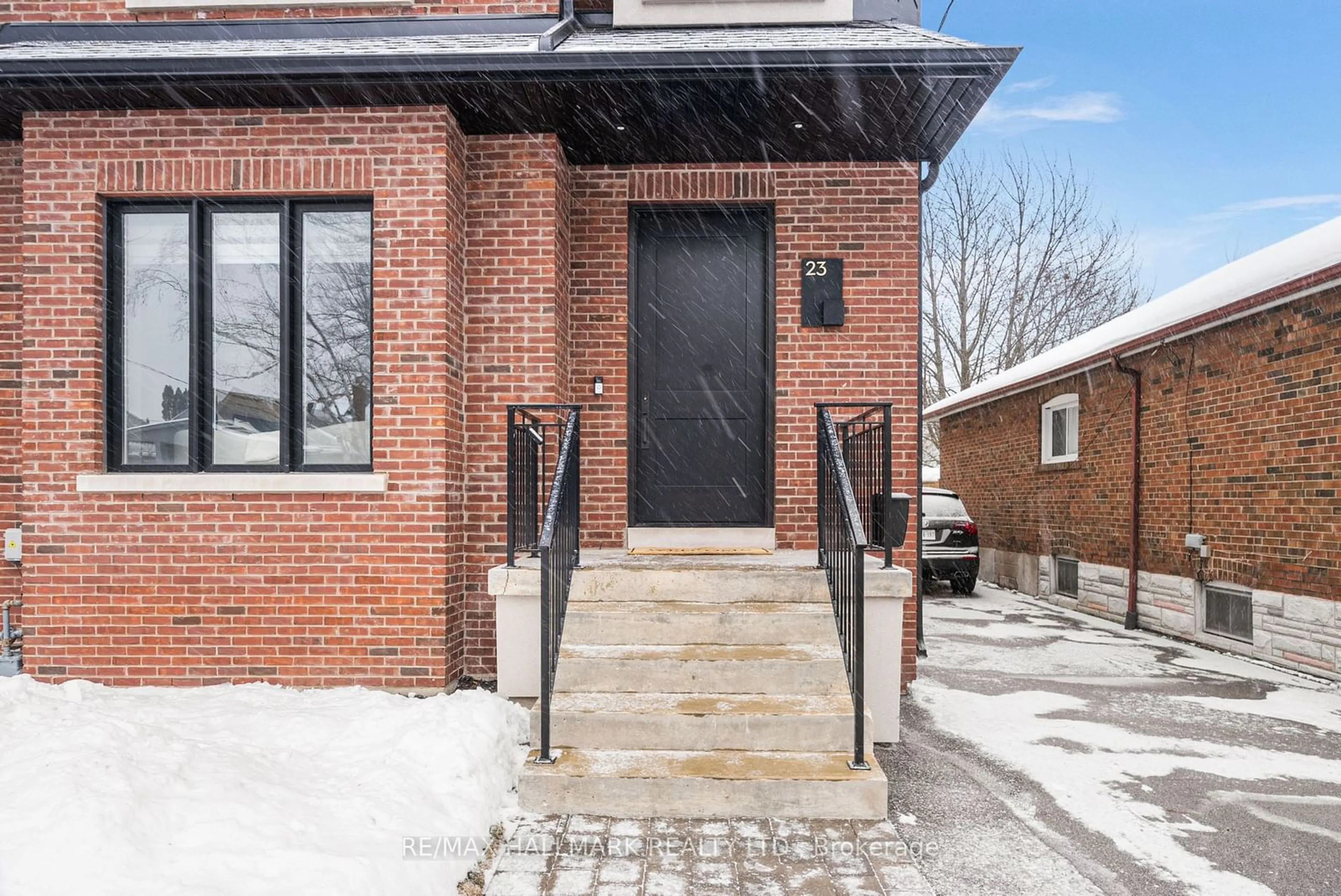 Home with brick exterior material, street for 23 Roblin Ave, Toronto Ontario M4C 3P7