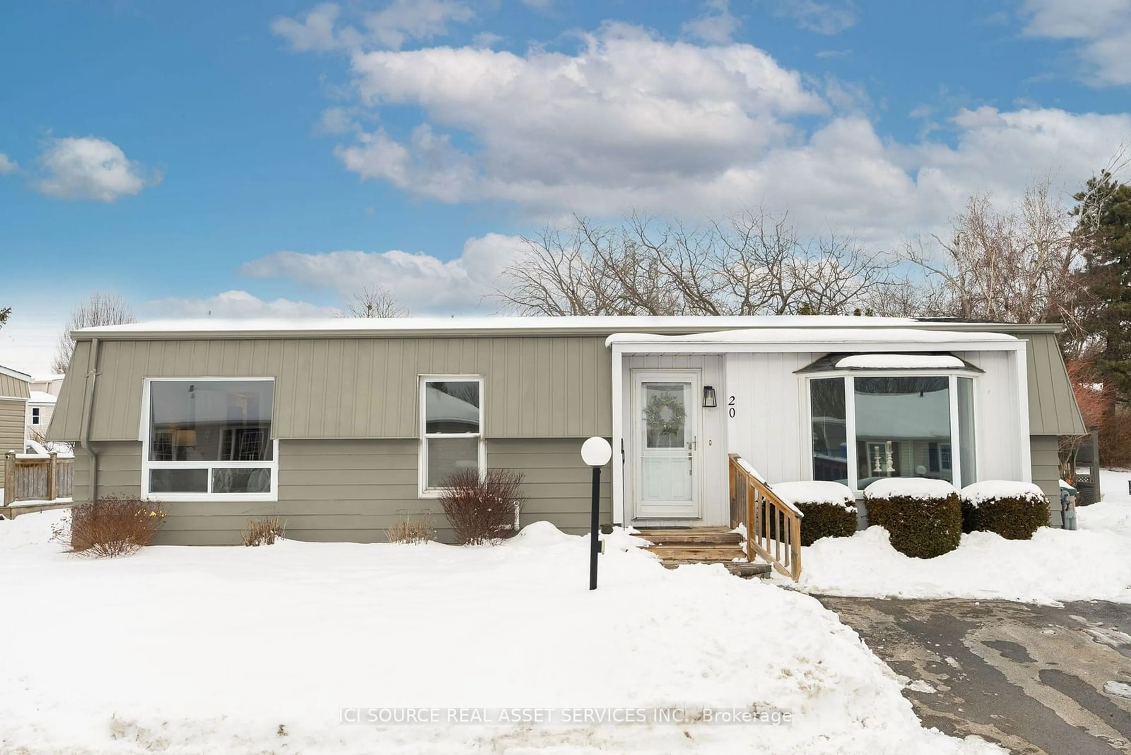 Home with vinyl exterior material, street for 20 Heritage Lane, Clarington Ontario L1B 1A7