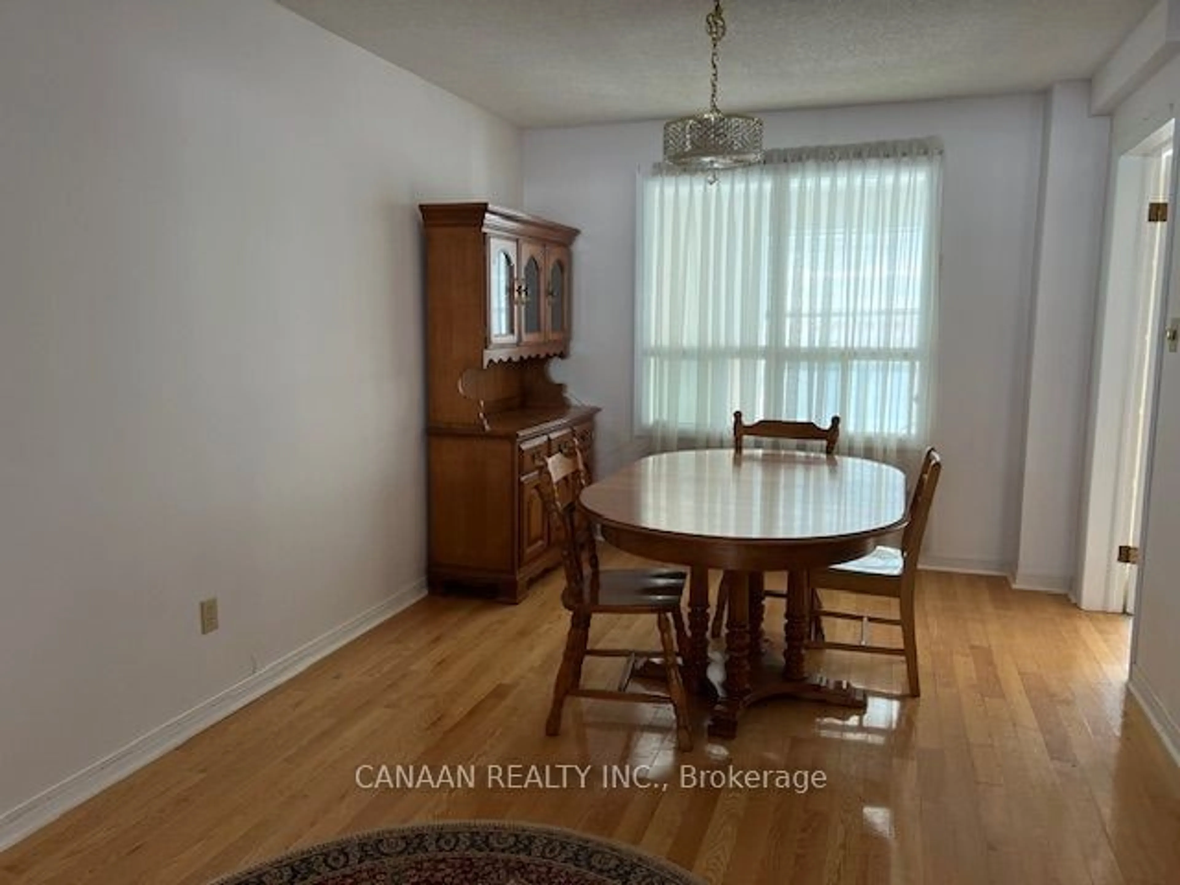 Dining room, wood/laminate floor for 7 Hillbeck Cres, Toronto Ontario M1B 2M8