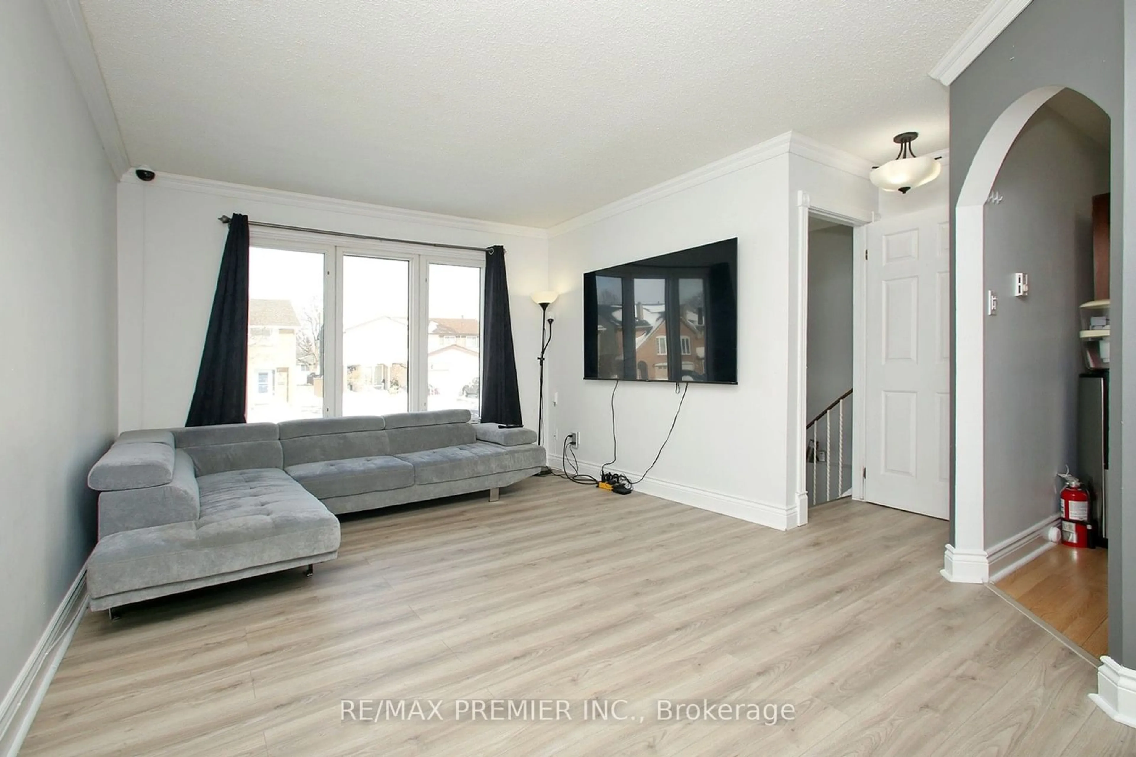 Living room with furniture, wood/laminate floor for 1329 Pinehurst Ave, Oshawa Ontario L1H 8J8