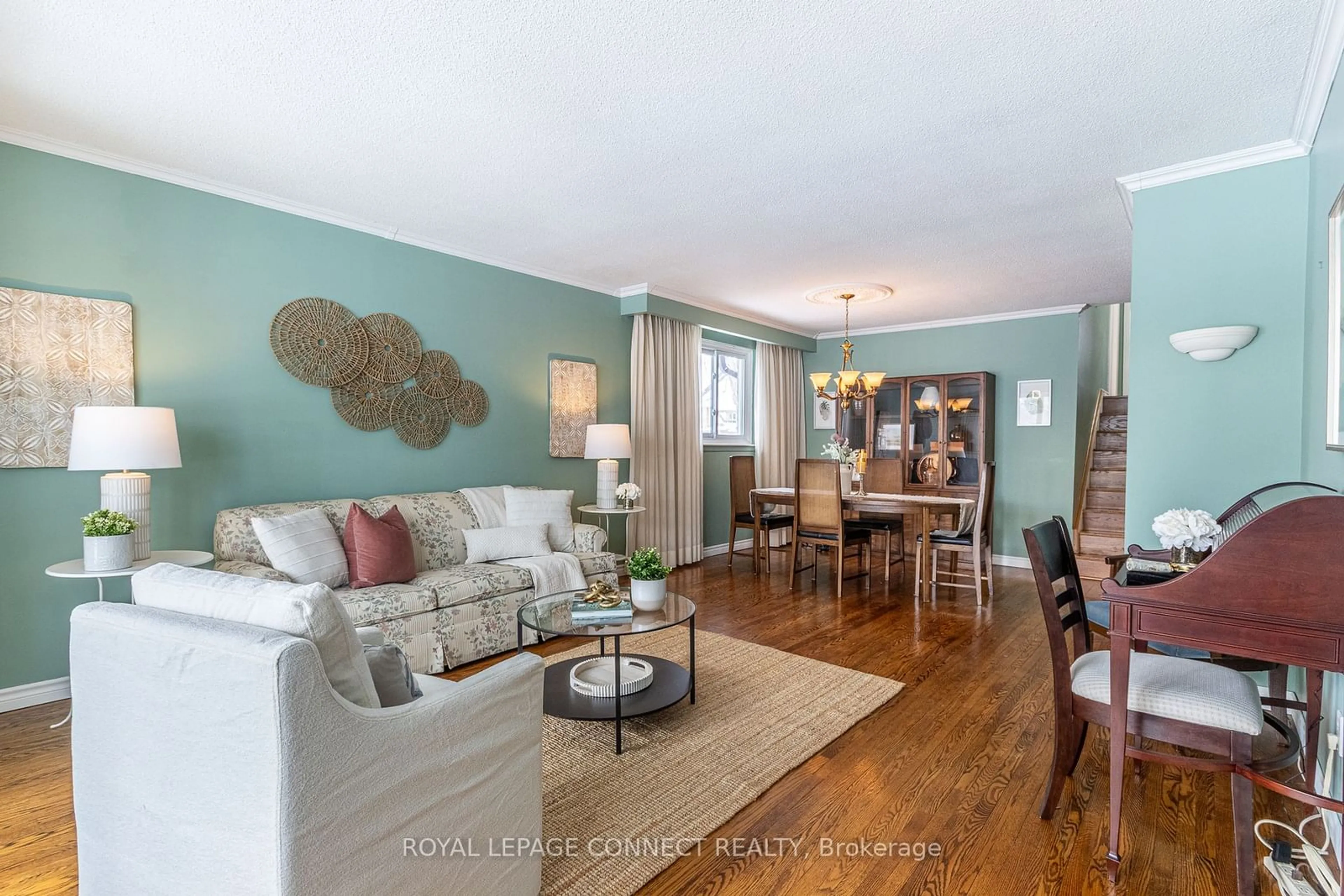 Living room with furniture, wood/laminate floor for 36 Tivoli Crt, Toronto Ontario M1E 2A4