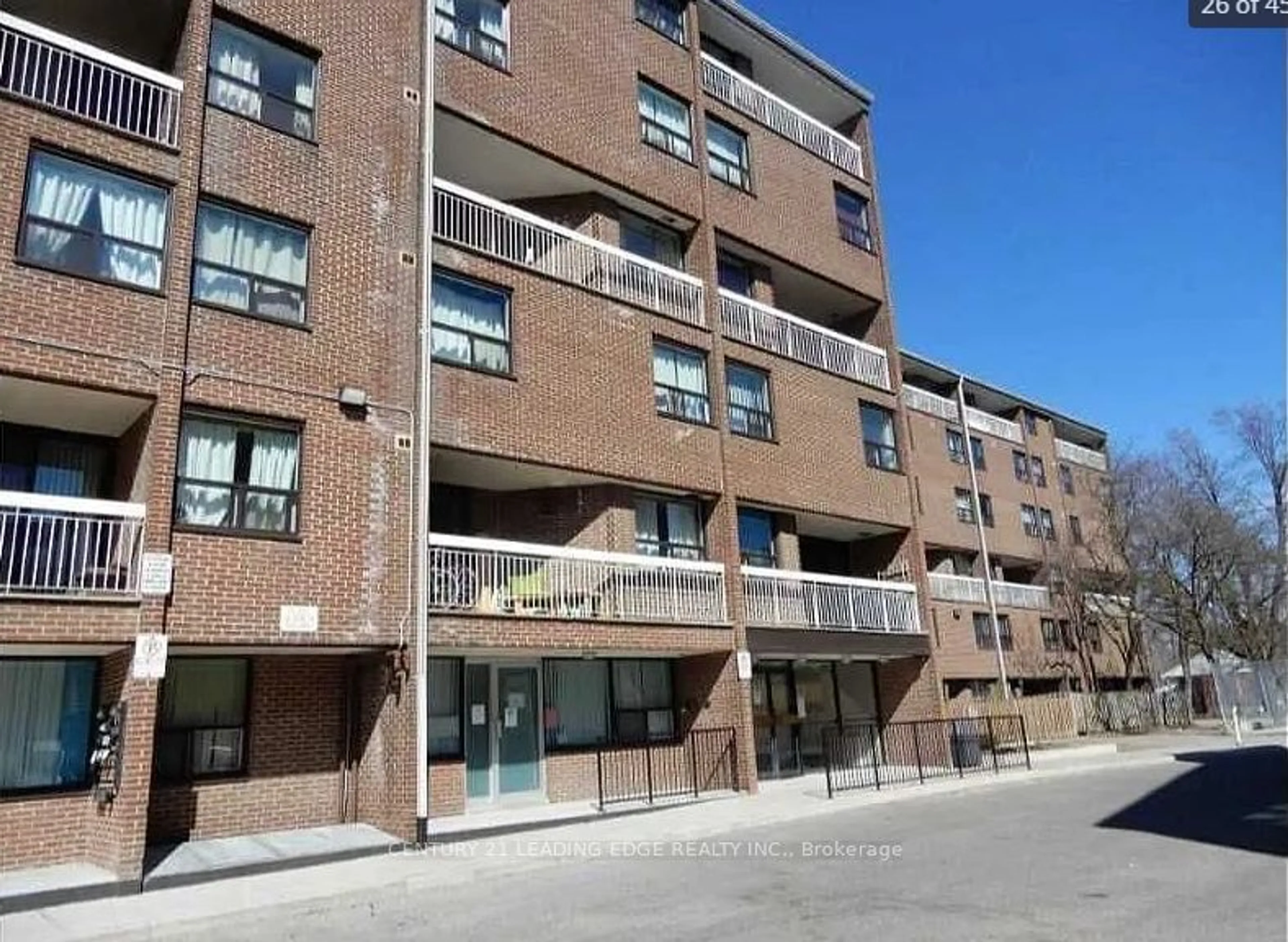 A pic from outside/outdoor area/front of a property/back of a property/a pic from drone, street for 4062 Lawrence Ave #306, Toronto Ontario M1E 4V5