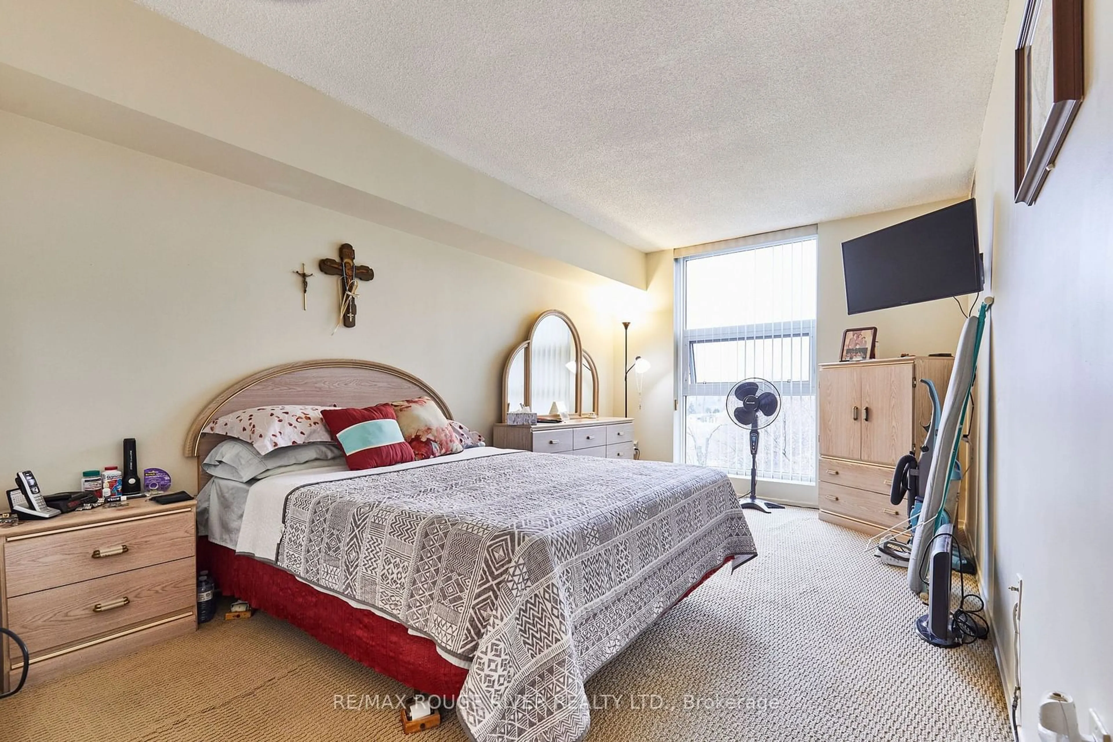 Bedroom with bed, unknown for 20 Dean Park Rd #716, Toronto Ontario M1B 3G9