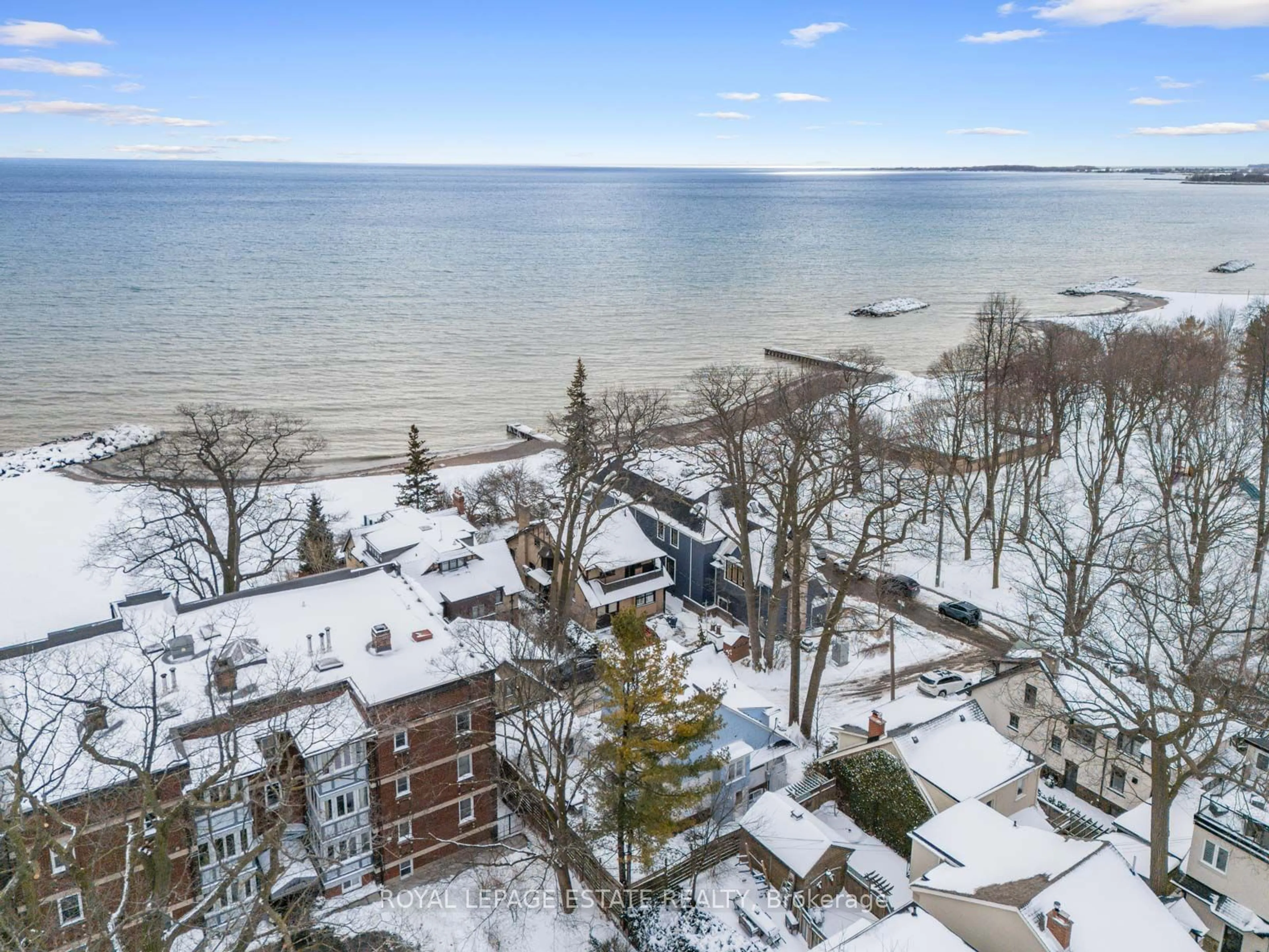 A pic from outside/outdoor area/front of a property/back of a property/a pic from drone, water/lake/river/ocean view for 15 Silver Birch Ave, Toronto Ontario M4E 3K8