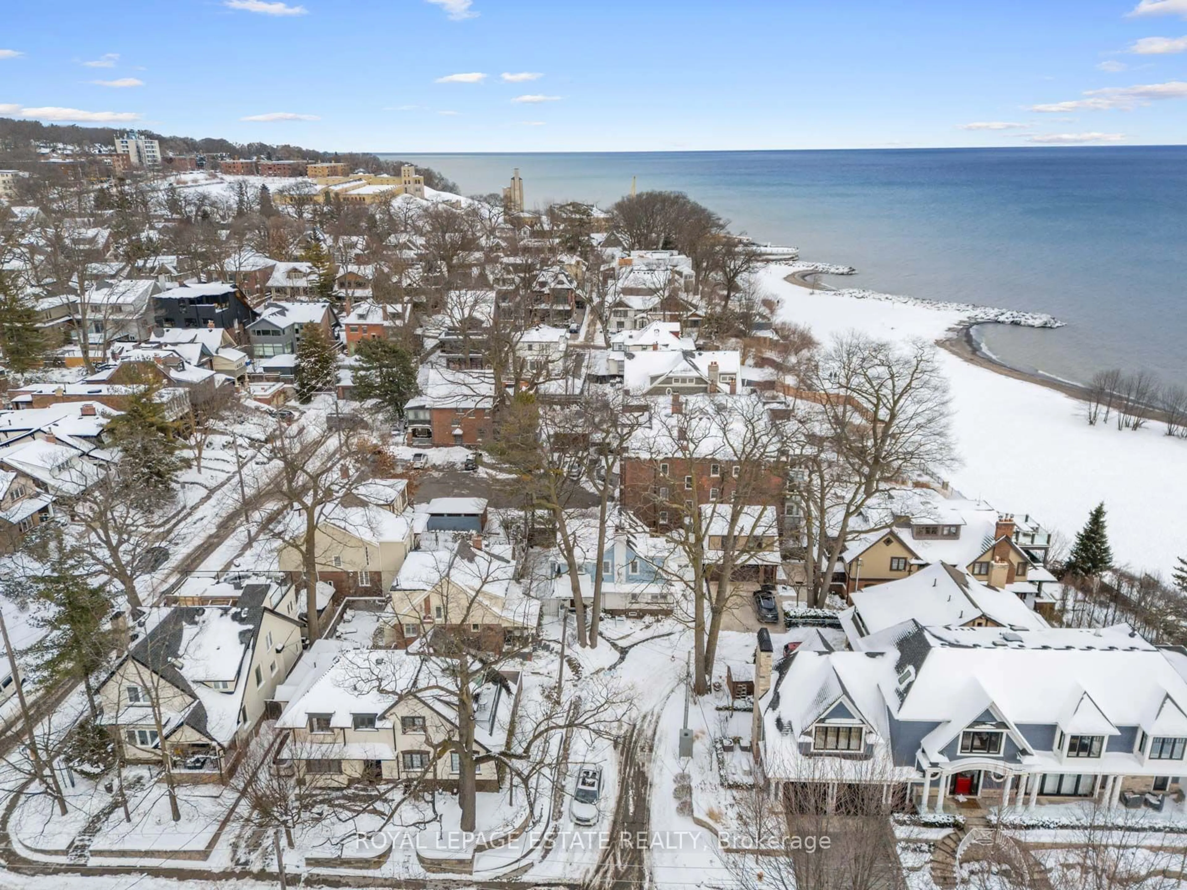 A pic from outside/outdoor area/front of a property/back of a property/a pic from drone, water/lake/river/ocean view for 15 Silver Birch Ave, Toronto Ontario M4E 3K8